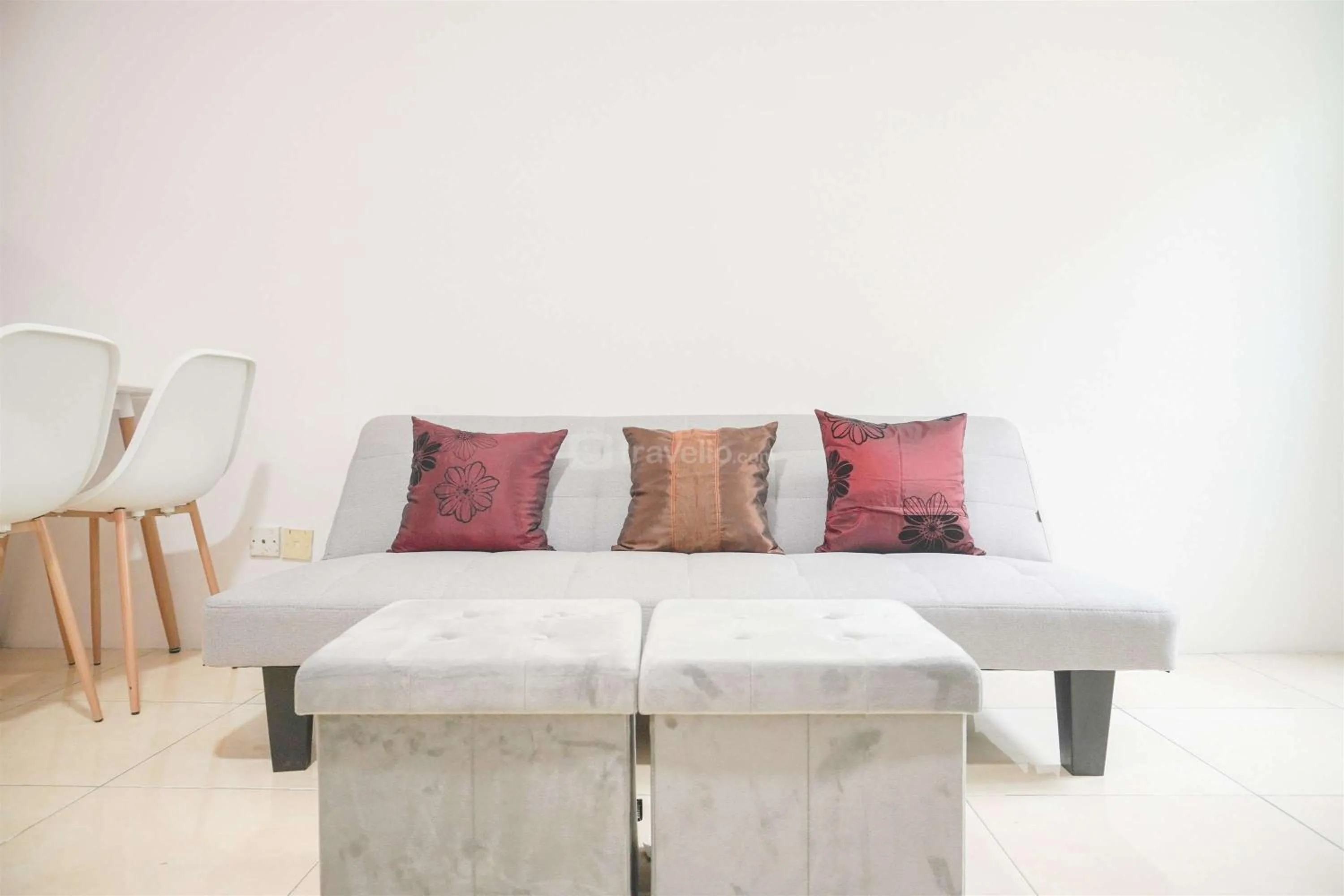 Bed in Modern and Homey 2BR at MT Haryono Square Apartment By Travelio