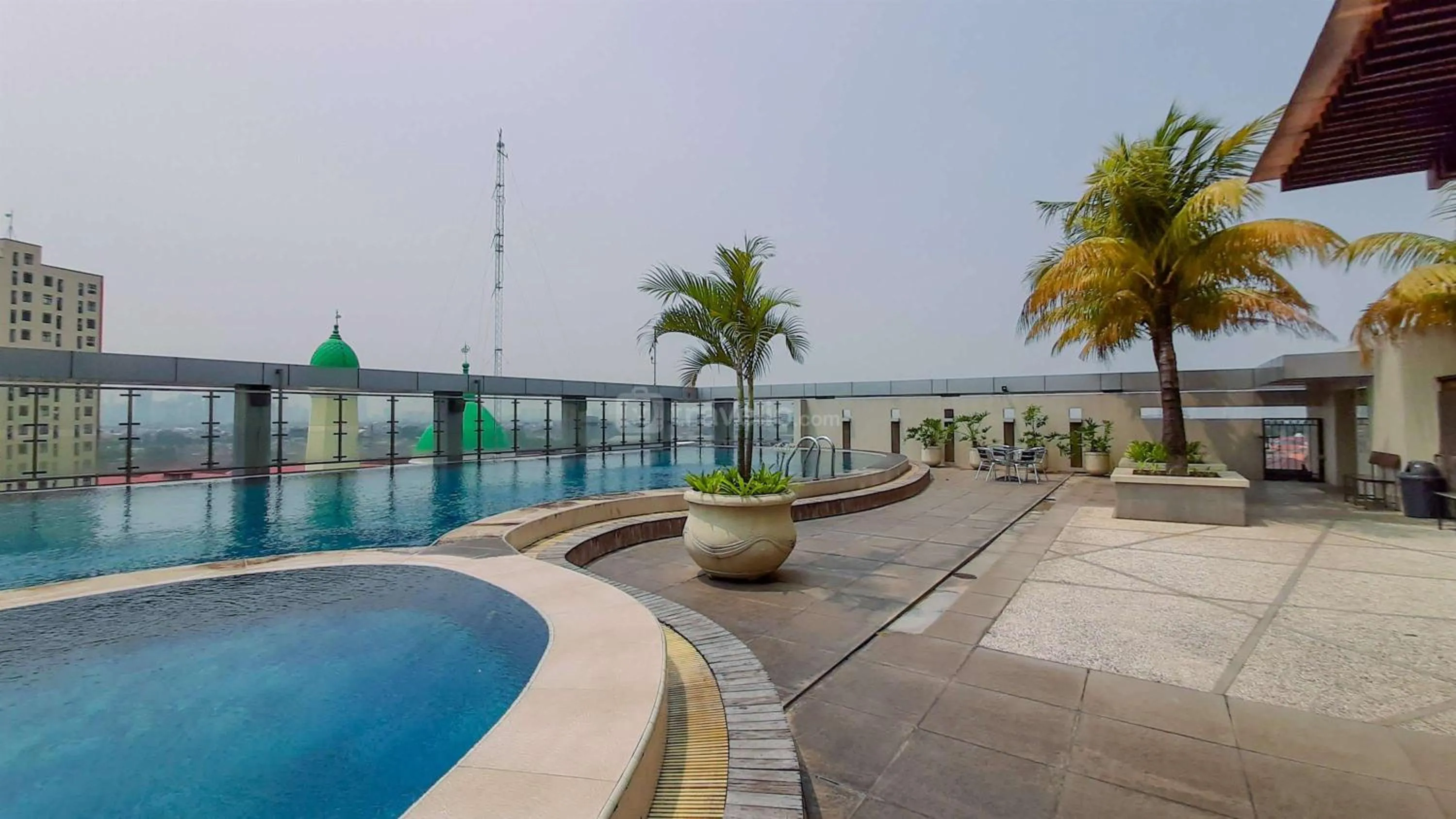 Swimming pool in Modern and Homey 2BR at MT Haryono Square Apartment By Travelio