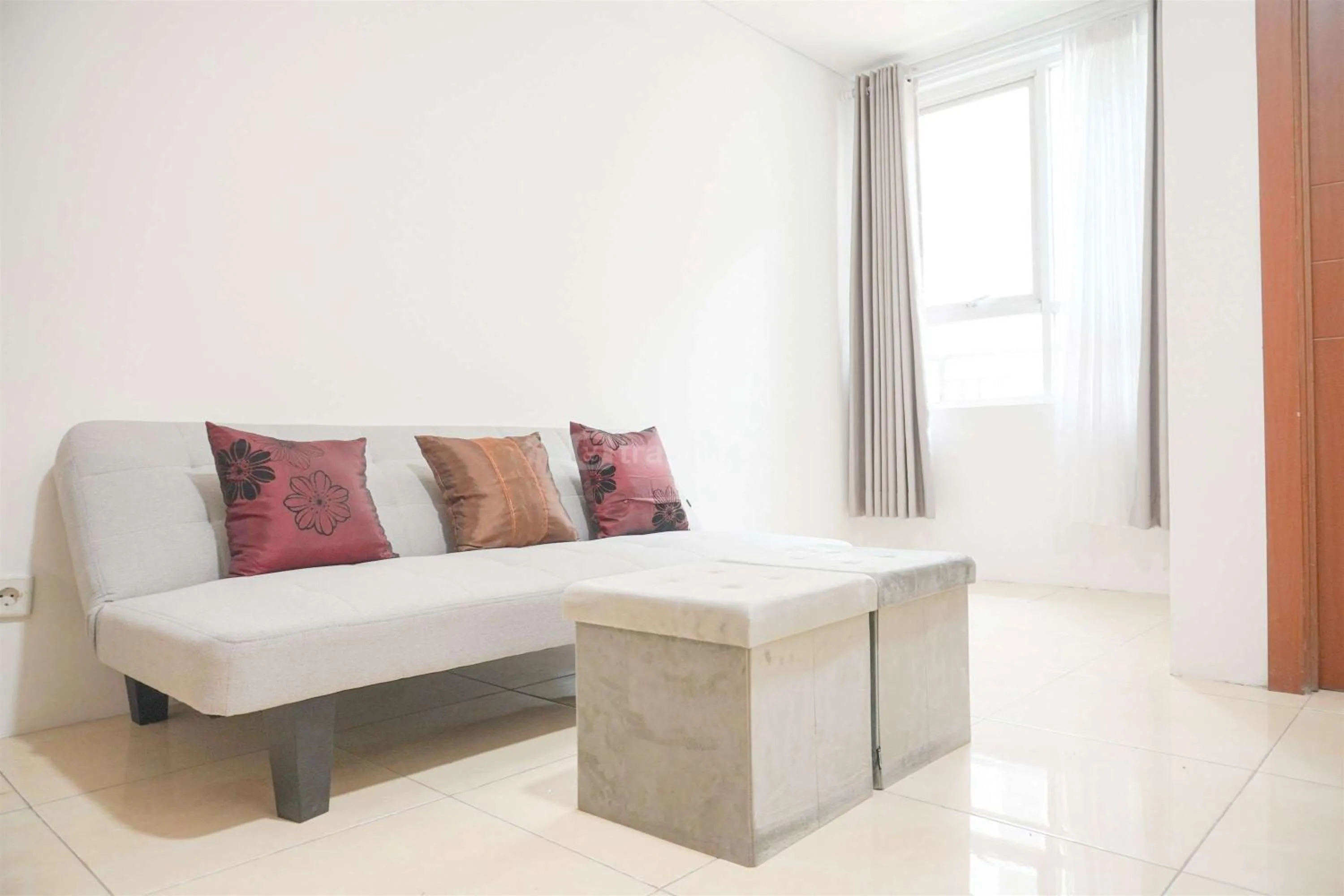Bed in Modern and Homey 2BR at MT Haryono Square Apartment By Travelio