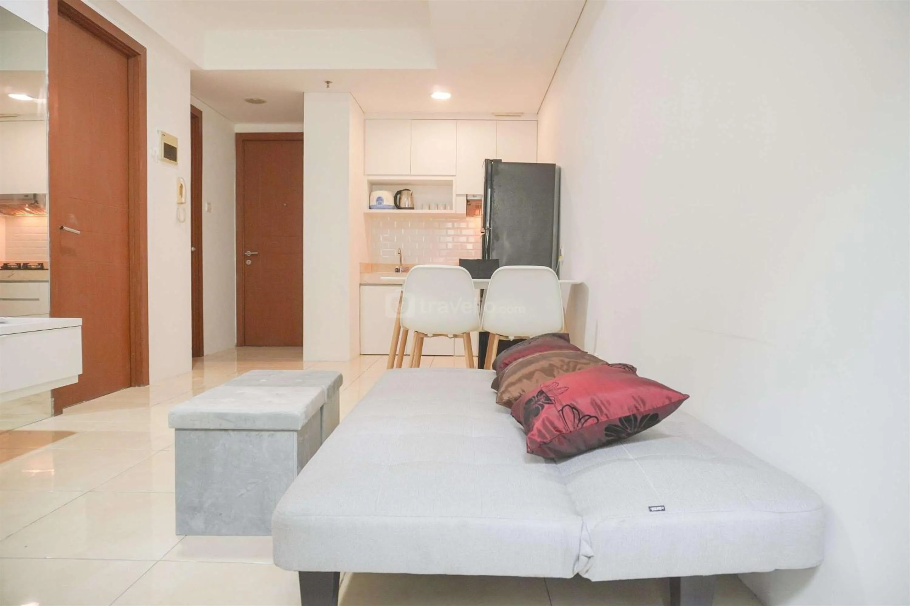Bed in Modern and Homey 2BR at MT Haryono Square Apartment By Travelio