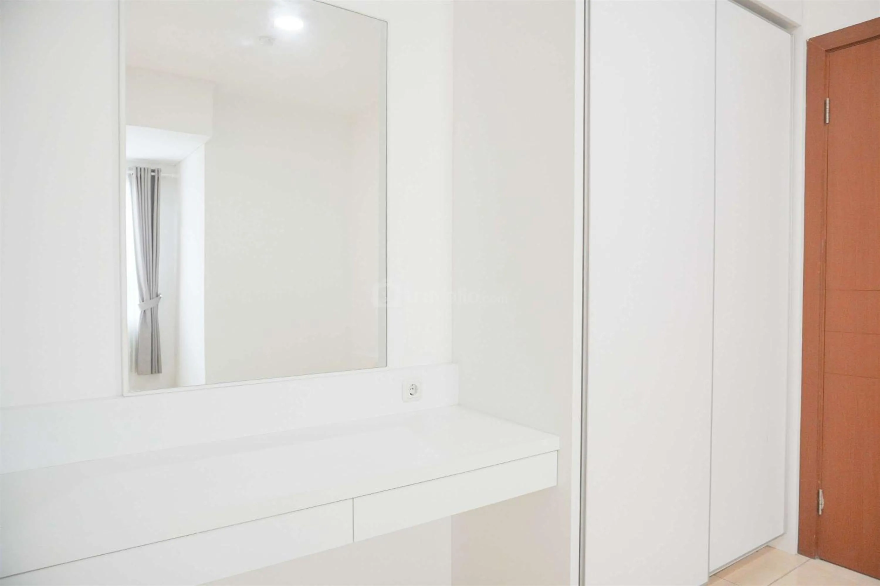 Bed in Modern and Homey 2BR at MT Haryono Square Apartment By Travelio