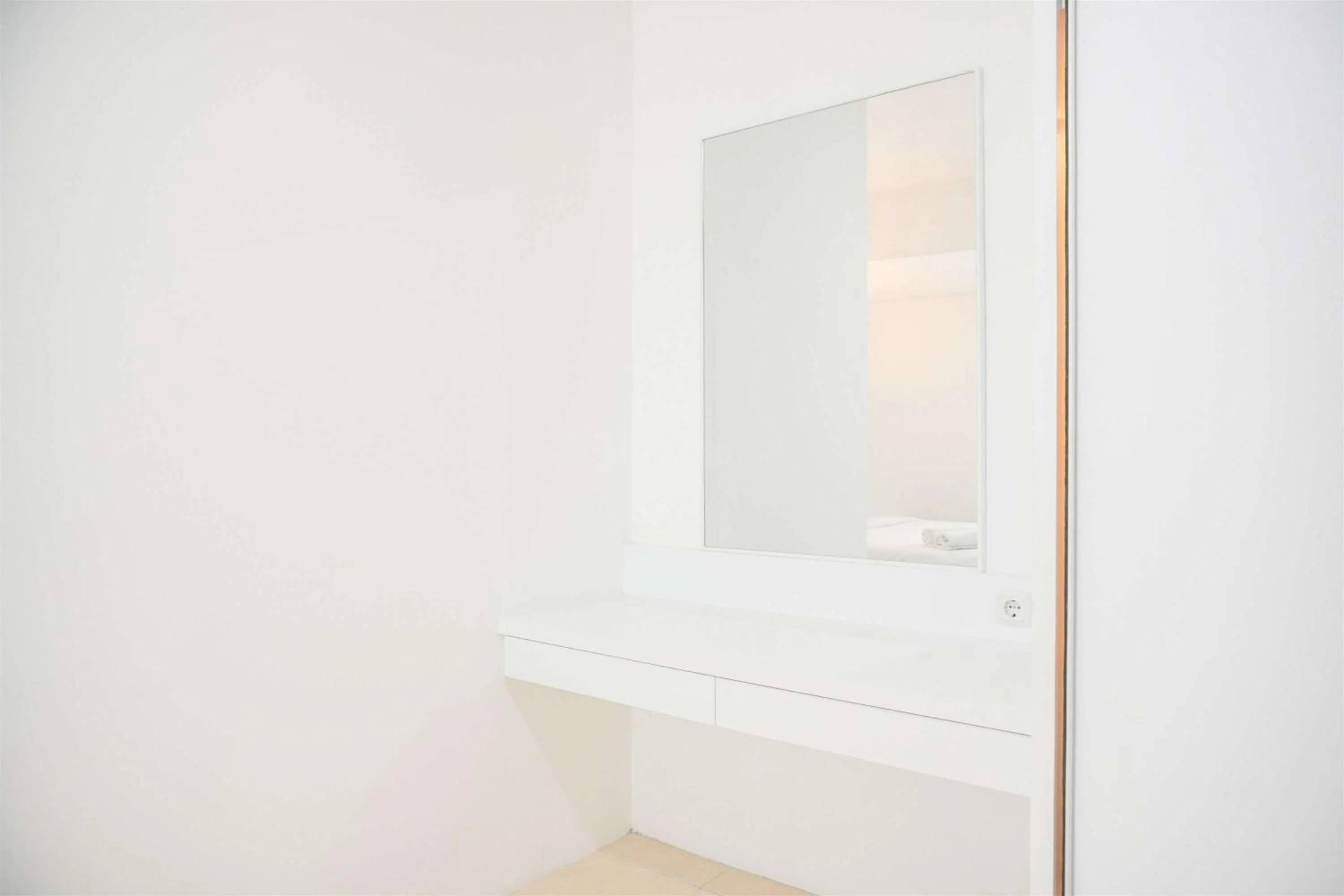 Bed in Modern and Homey 2BR at MT Haryono Square Apartment By Travelio