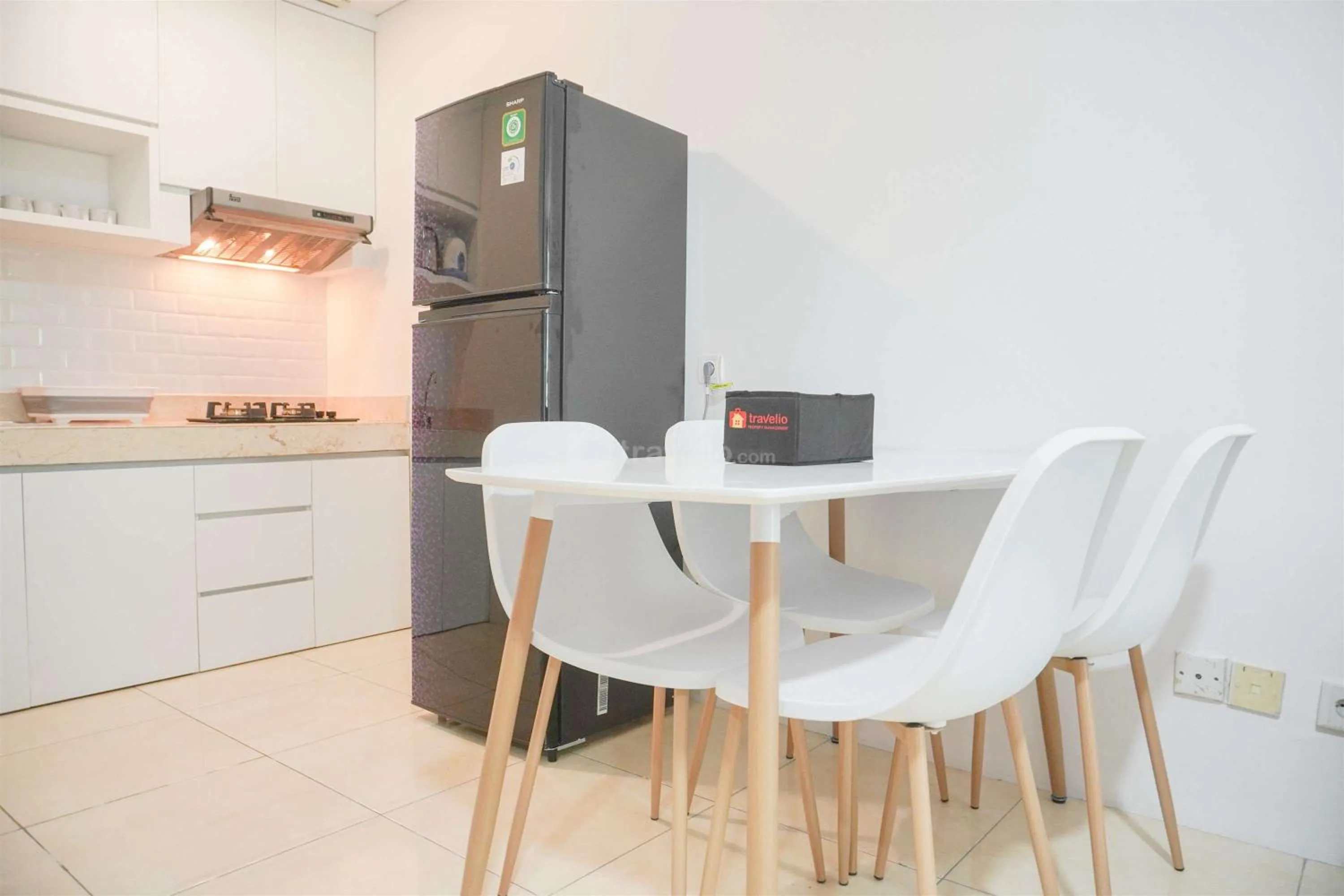 Bed in Modern and Homey 2BR at MT Haryono Square Apartment By Travelio