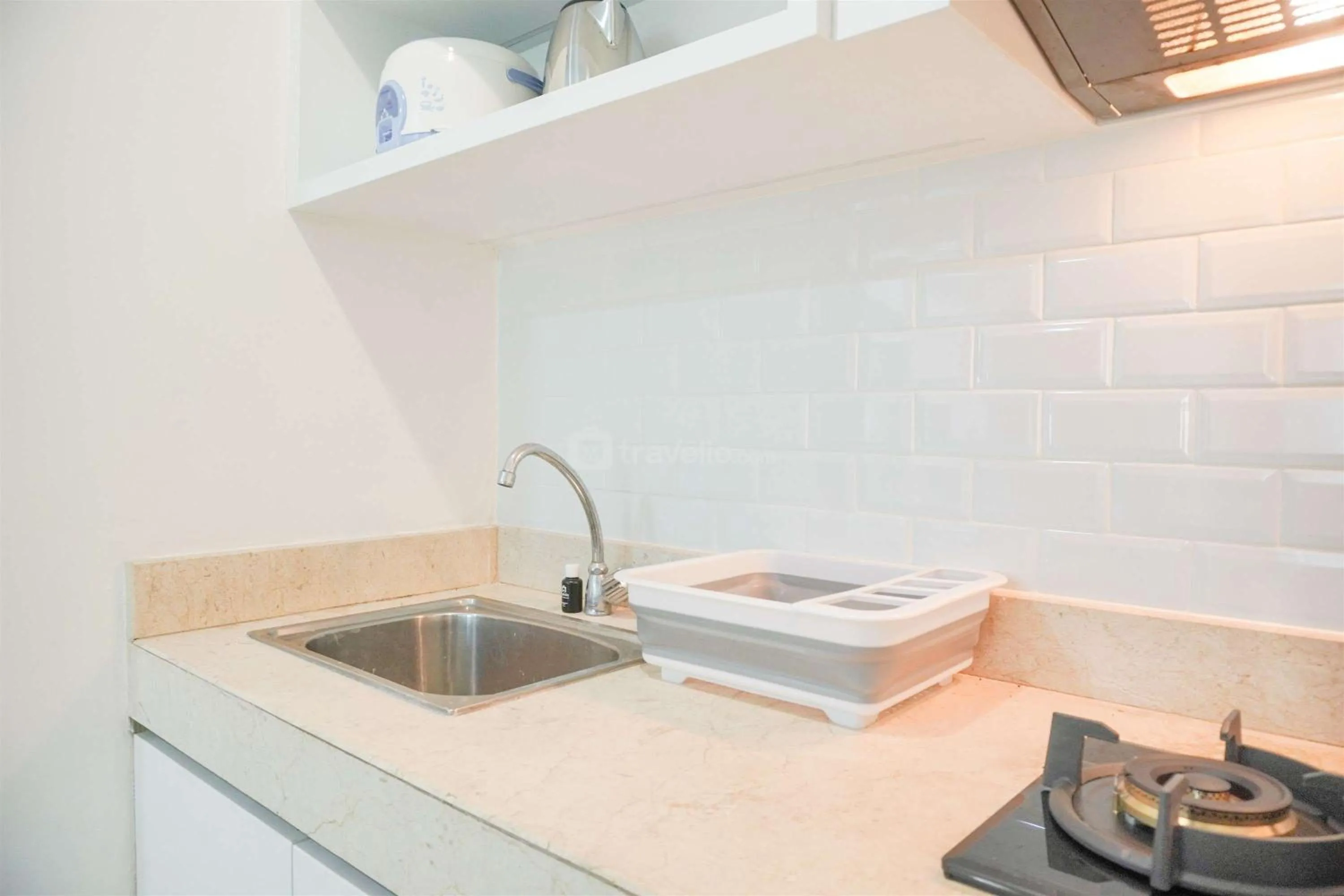 Bed in Modern and Homey 2BR at MT Haryono Square Apartment By Travelio