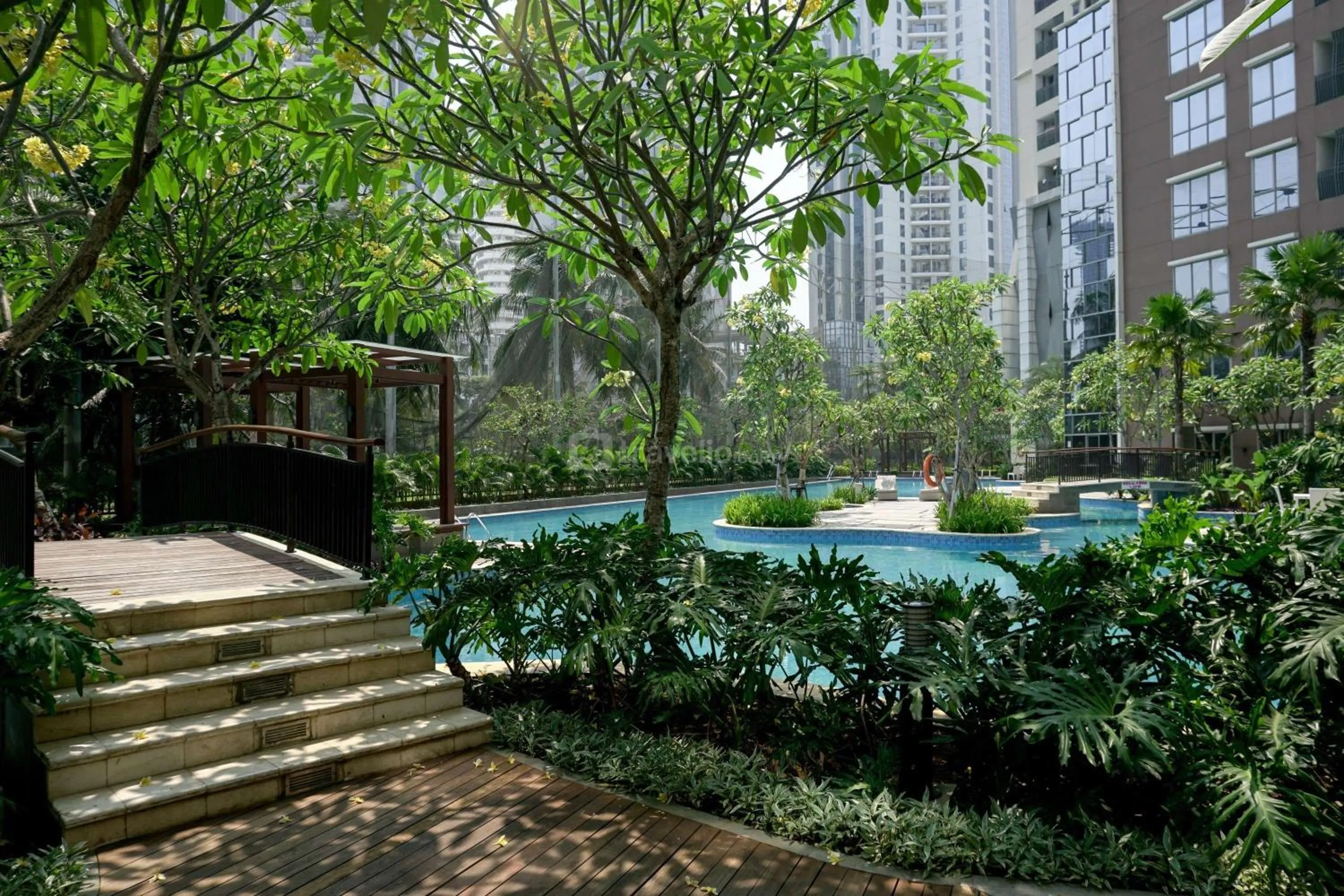 Bed in Minimalist Design 2BR Apartment The Mansion Kemayoran near JIEXPO By Travelio