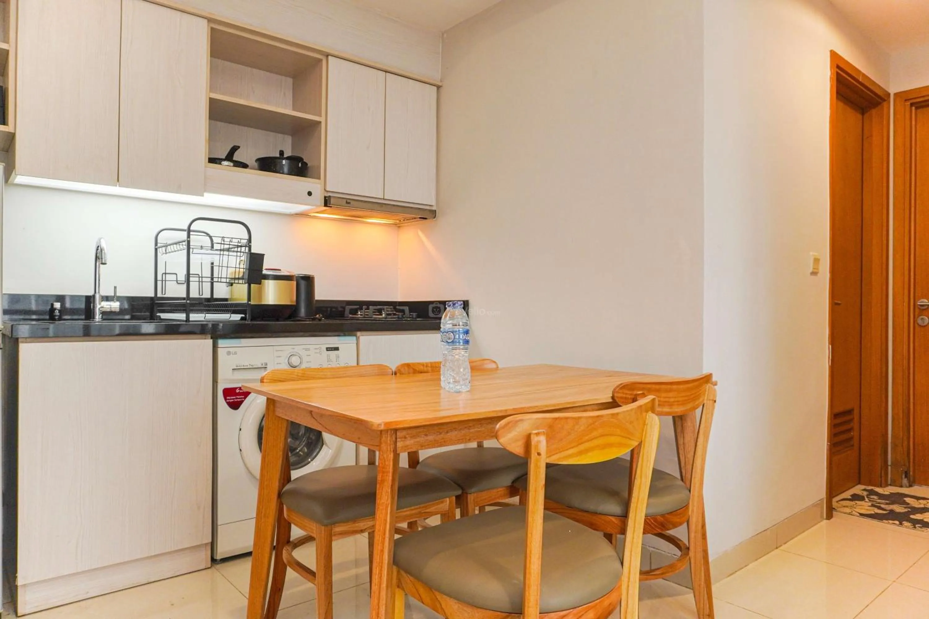 Bed in Minimalist Design 2BR Apartment The Mansion Kemayoran near JIEXPO By Travelio