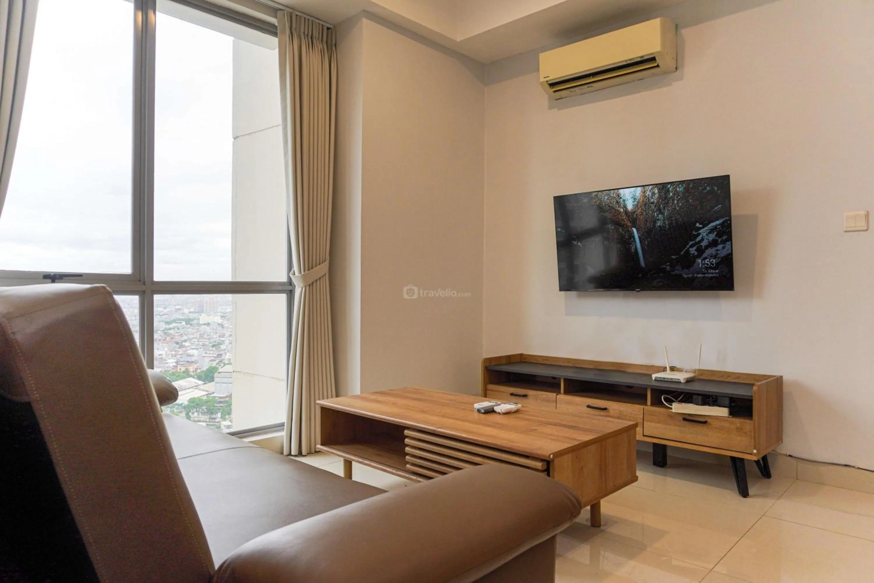 Bed in Minimalist Design 2BR Apartment The Mansion Kemayoran near JIEXPO By Travelio