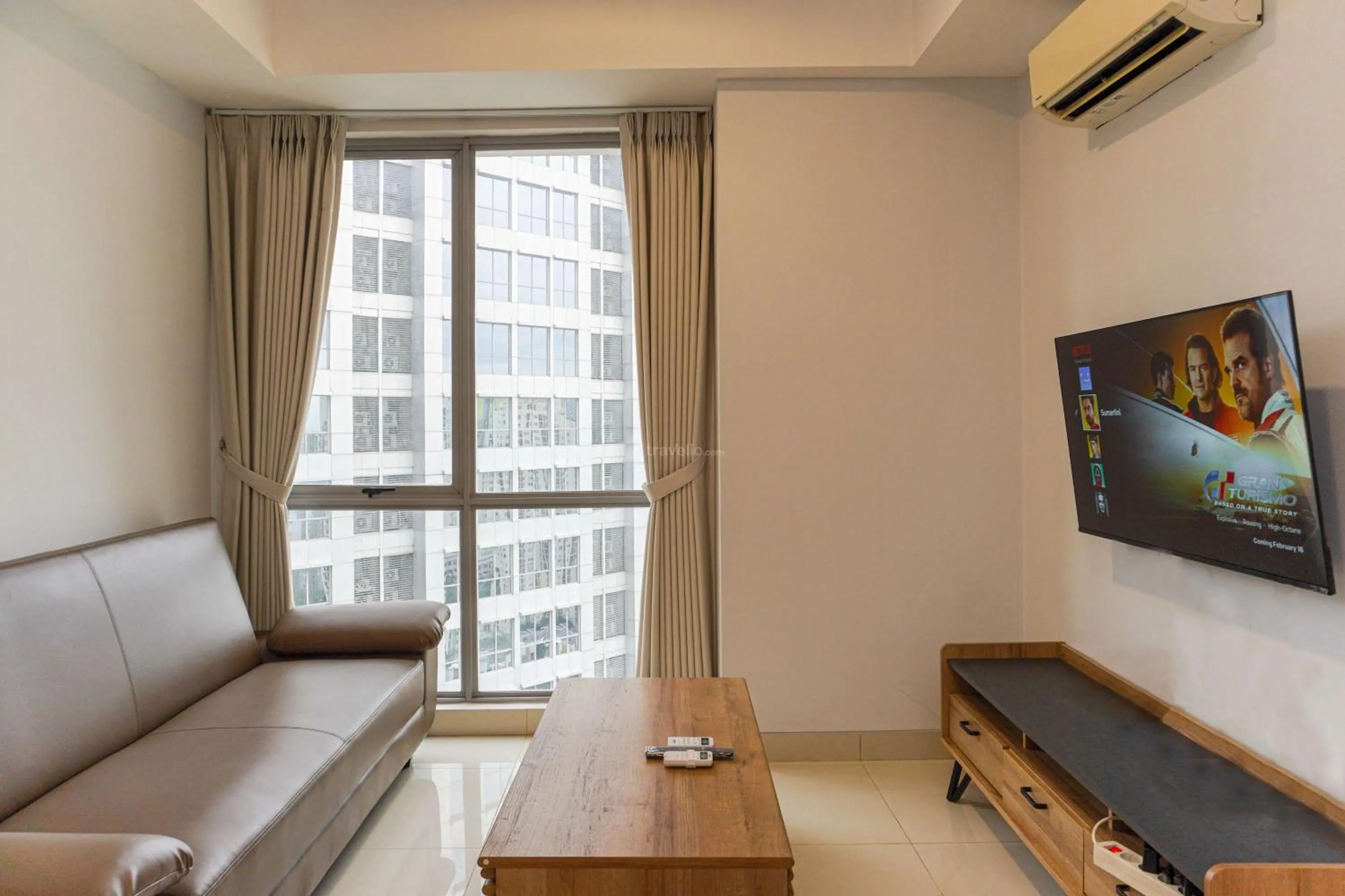 Bed in Minimalist Design 2BR Apartment The Mansion Kemayoran near JIEXPO By Travelio