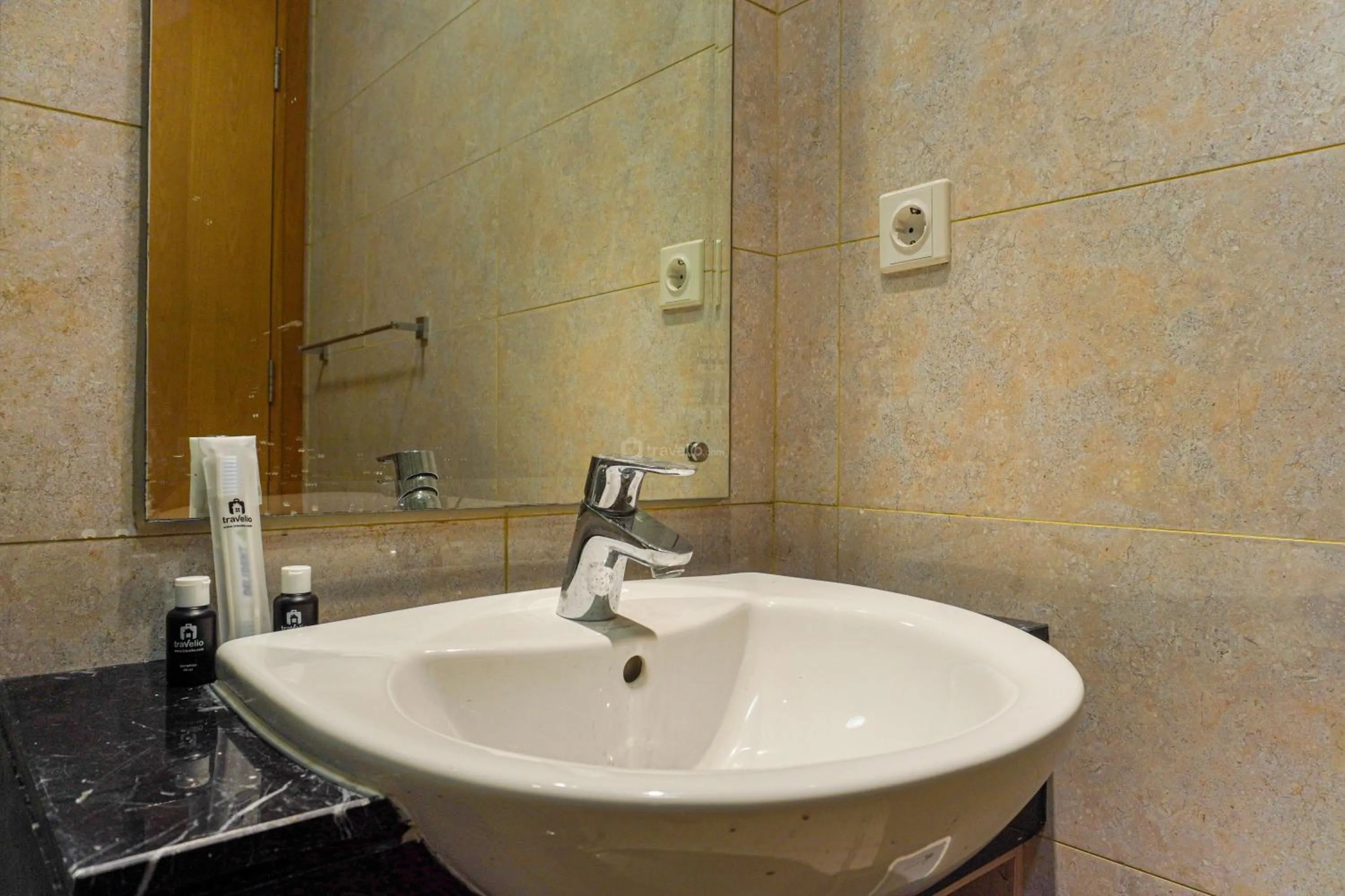 Bed in Minimalist Design 2BR Apartment The Mansion Kemayoran near JIEXPO By Travelio