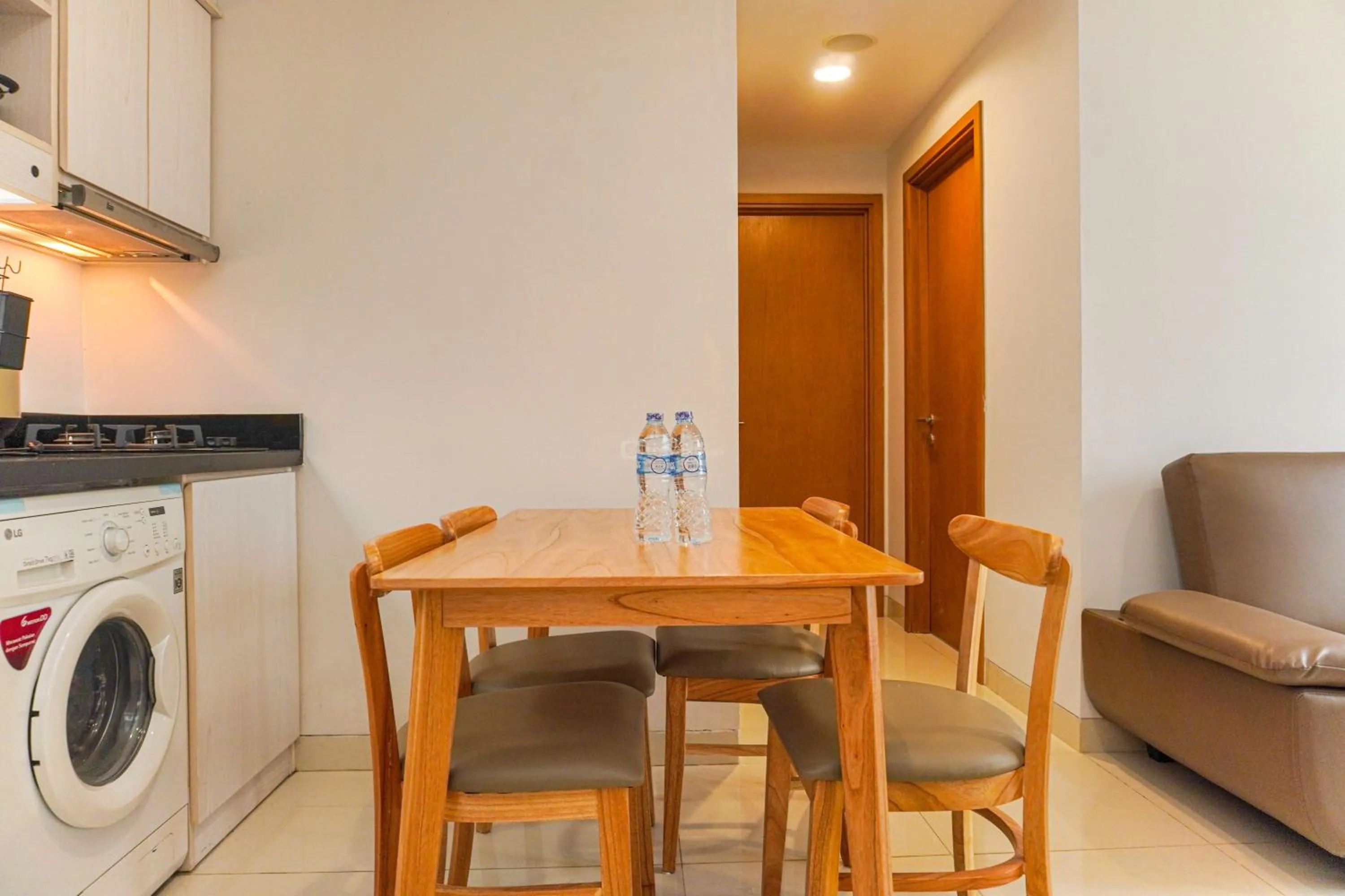 Bed in Minimalist Design 2BR Apartment The Mansion Kemayoran near JIEXPO By Travelio