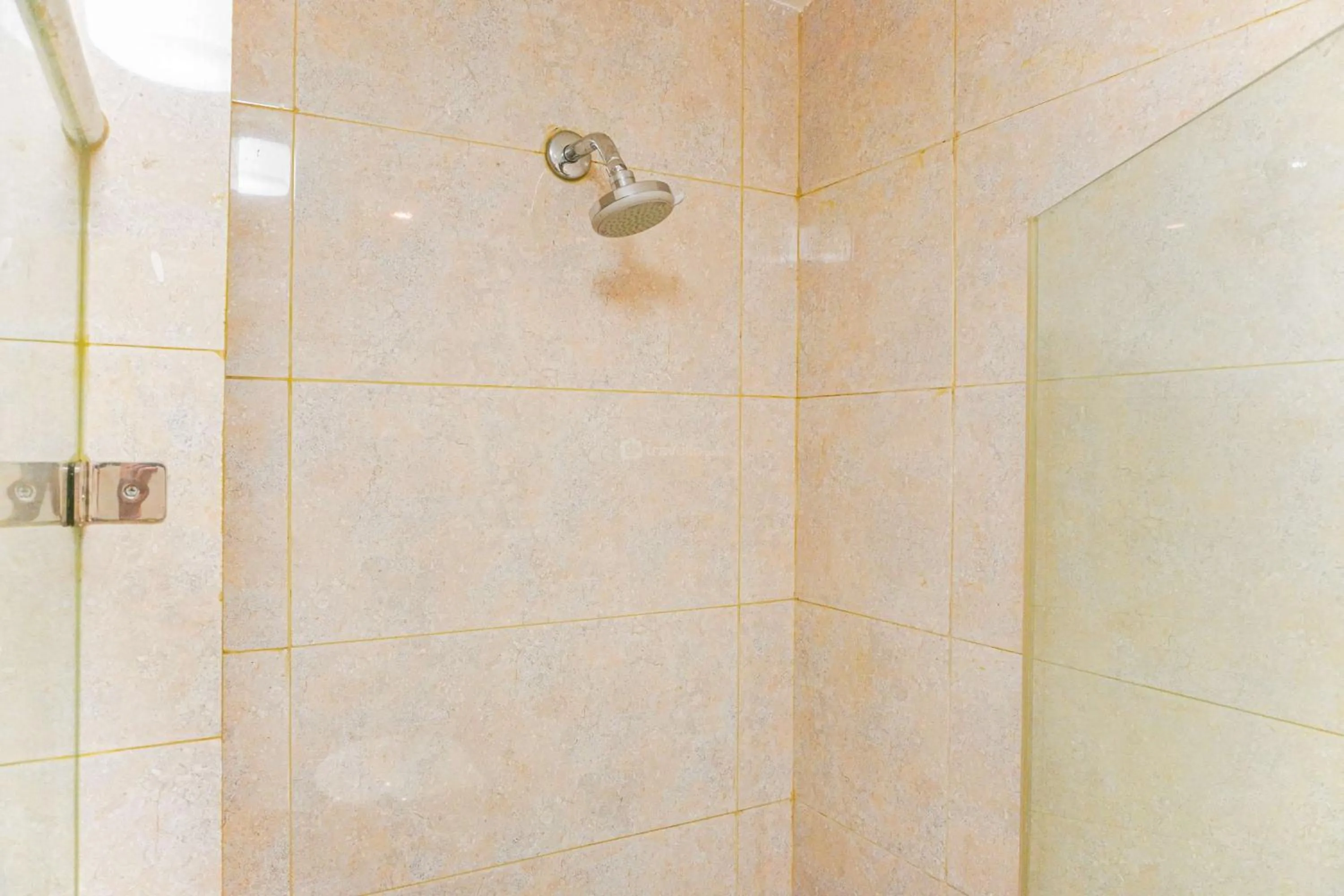 Bathroom in Minimalist Design 2BR Apartment The Mansion Kemayoran near JIEXPO By Travelio