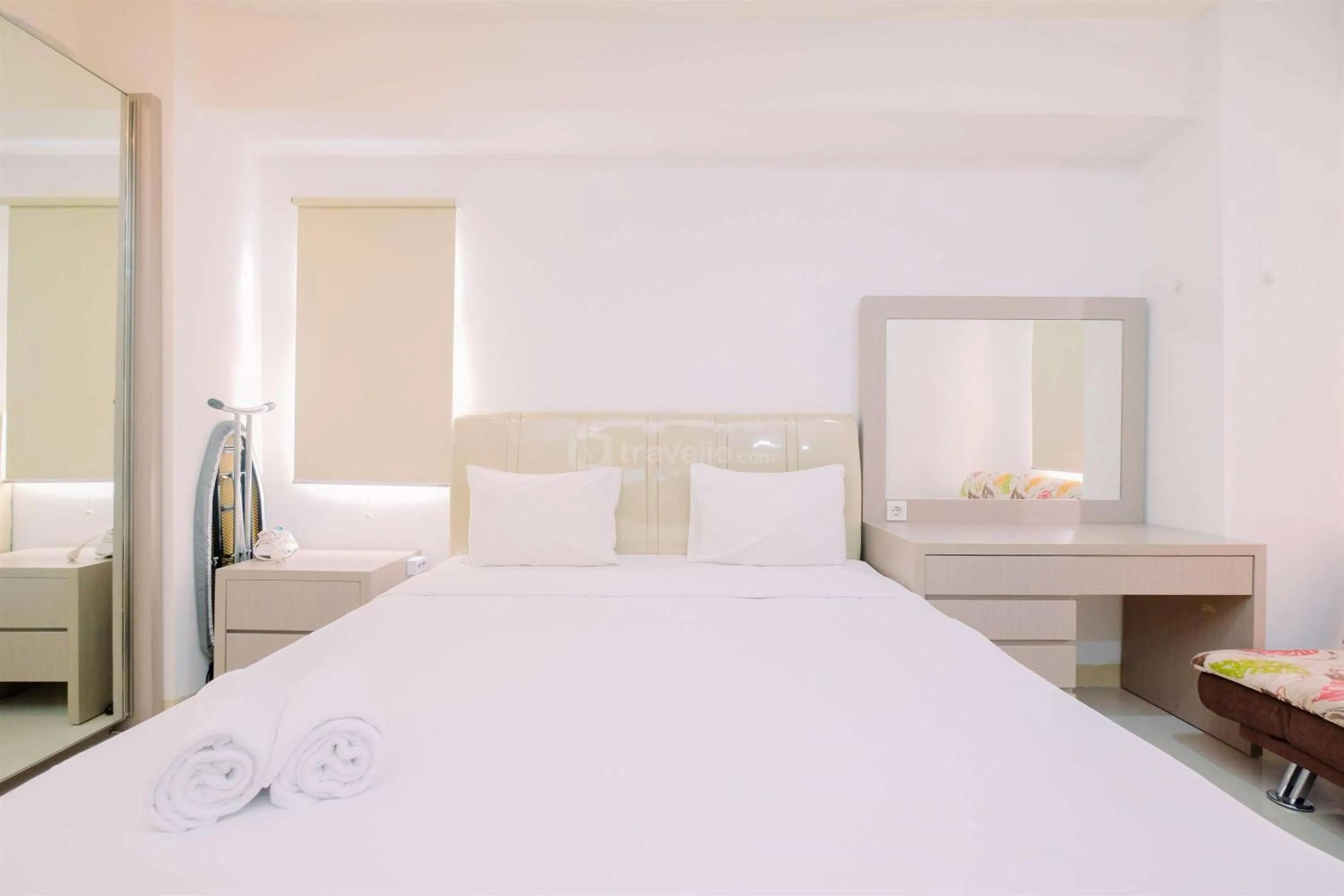 Bed in Good Deal and Cozy Studio Green Pramuka City Apartment By Travelio