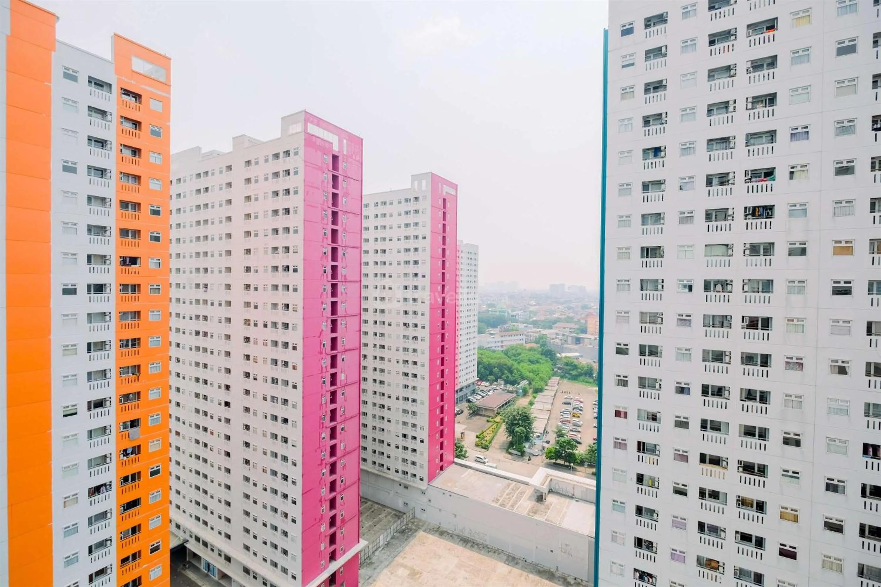 Bed in Good Deal and Cozy Studio Green Pramuka City Apartment By Travelio
