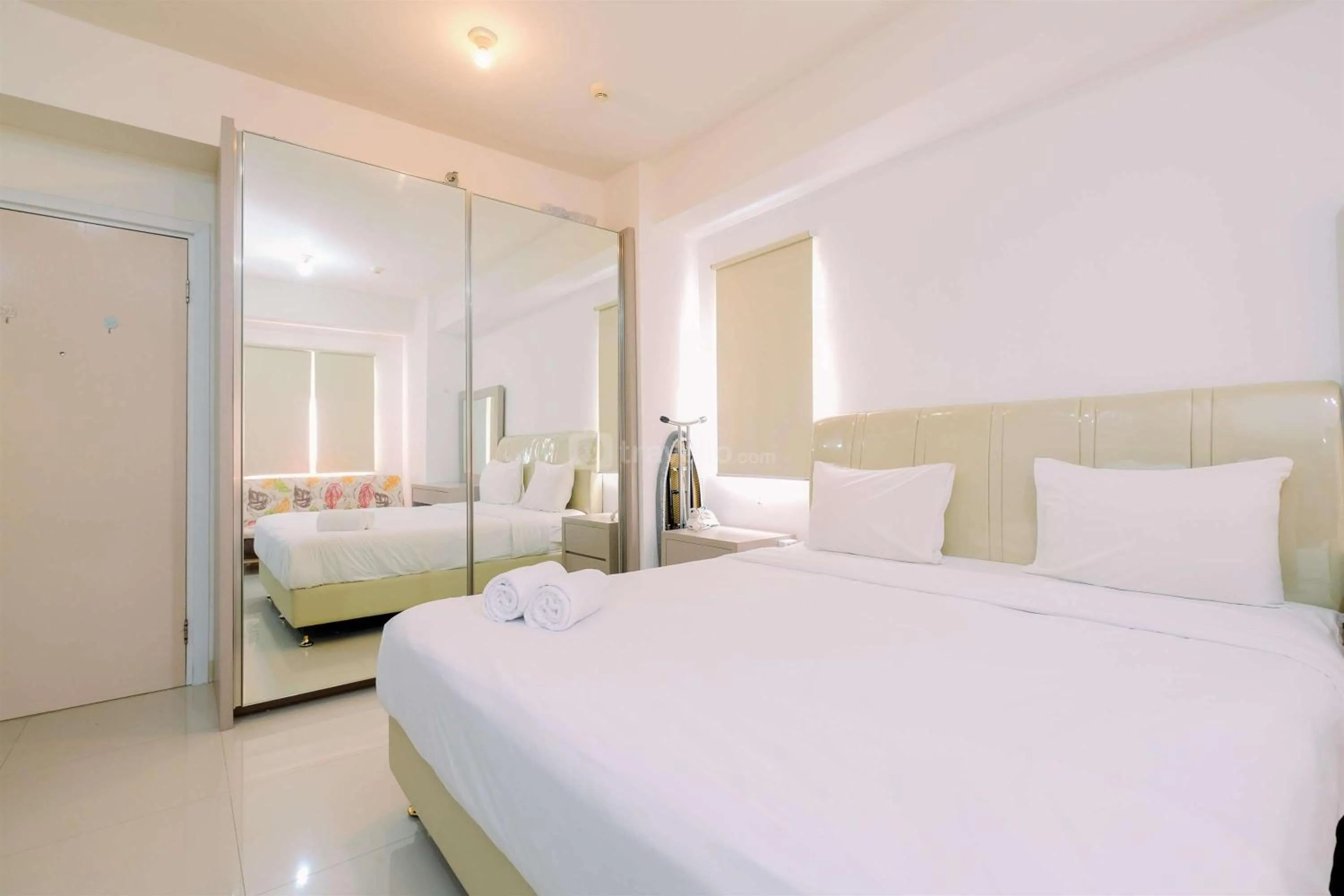 Bed in Good Deal and Cozy Studio Green Pramuka City Apartment By Travelio