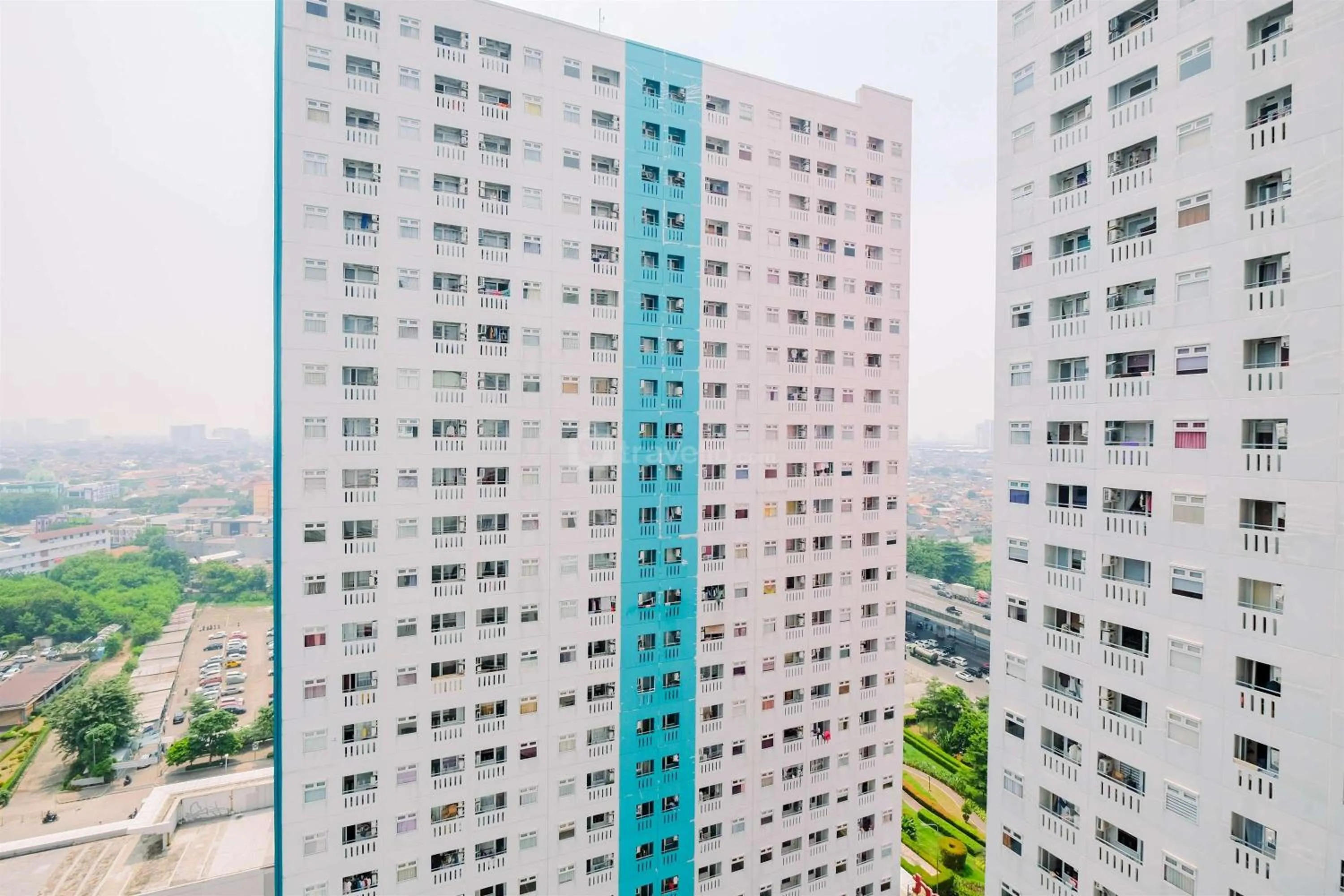 Bed in Good Deal and Cozy Studio Green Pramuka City Apartment By Travelio
