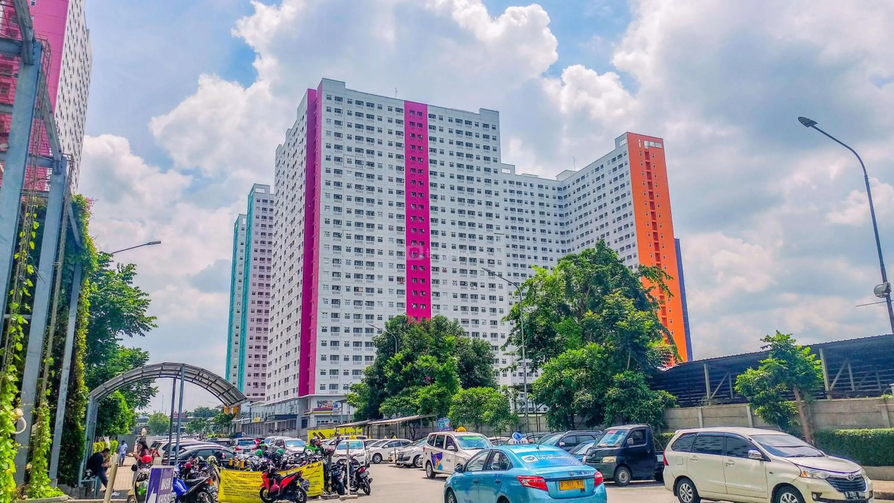 Property building in Good Deal and Cozy Studio Green Pramuka City Apartment By Travelio