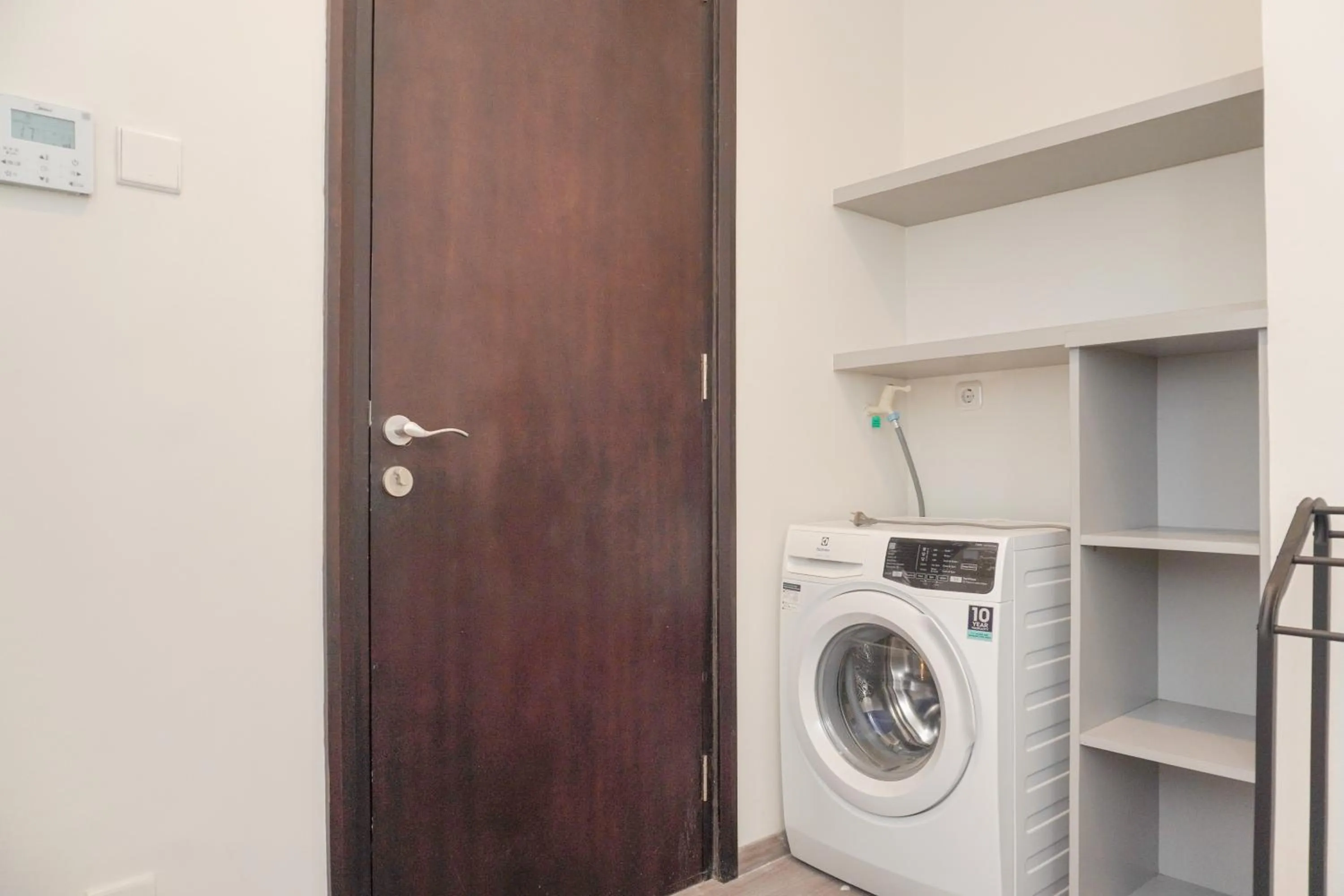 Bathroom in Comfort and Elegant 2BR Sudirman Suites Apartment By Travelio