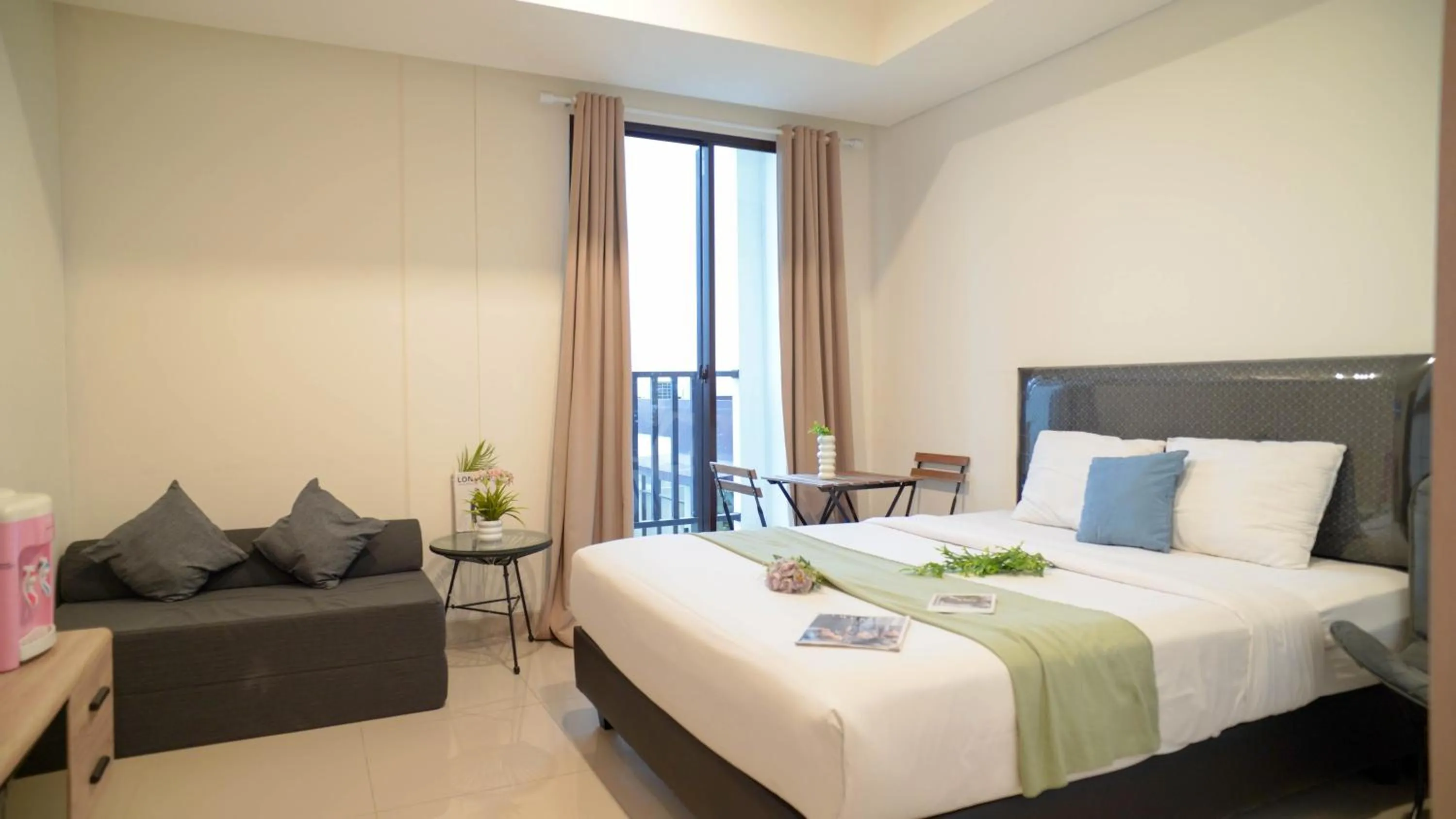 Bed in Spacious and Homey Studio at Cleon Park Apartment By Travelio