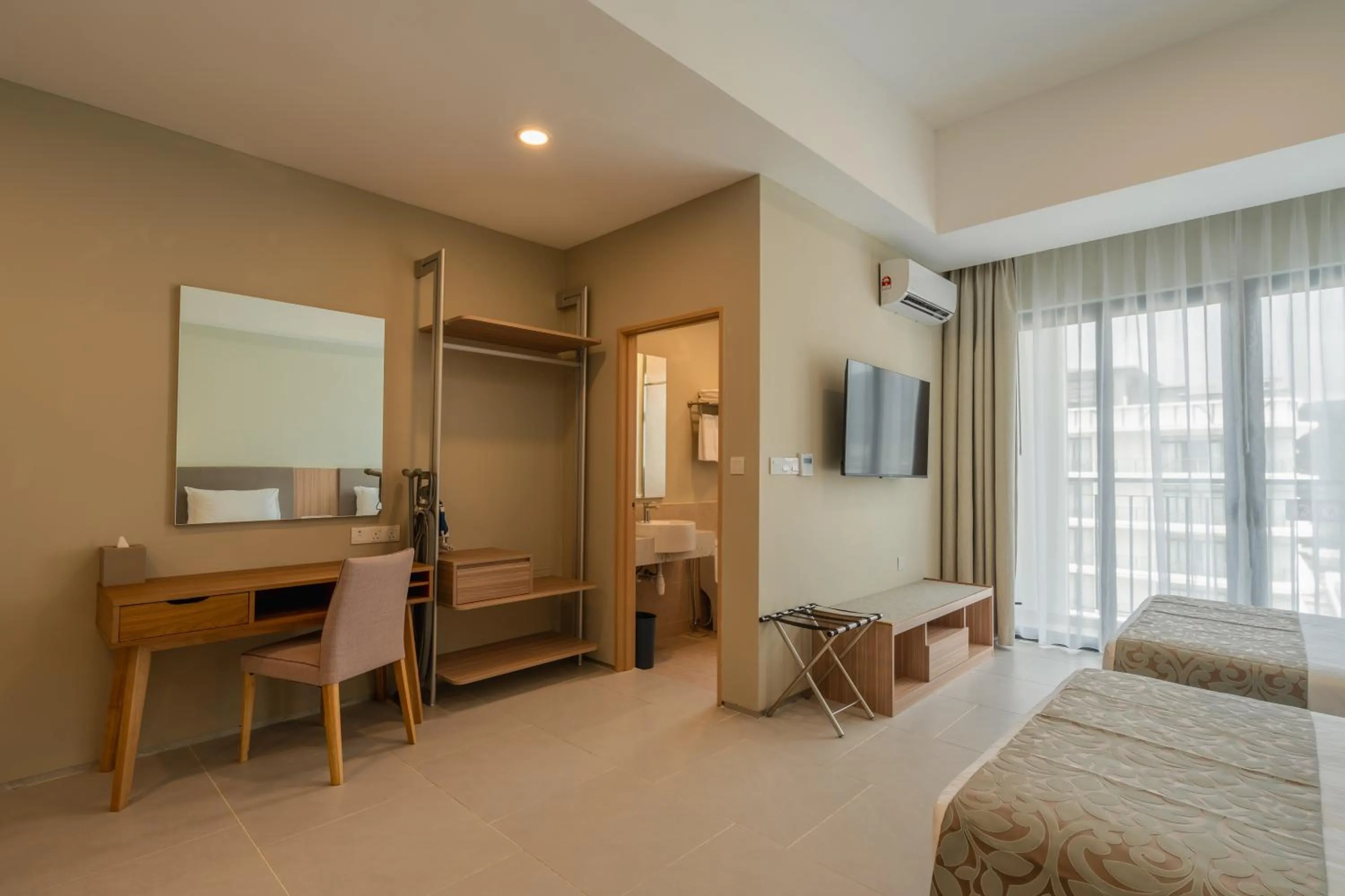 Bed in Zenith Suites Cameron