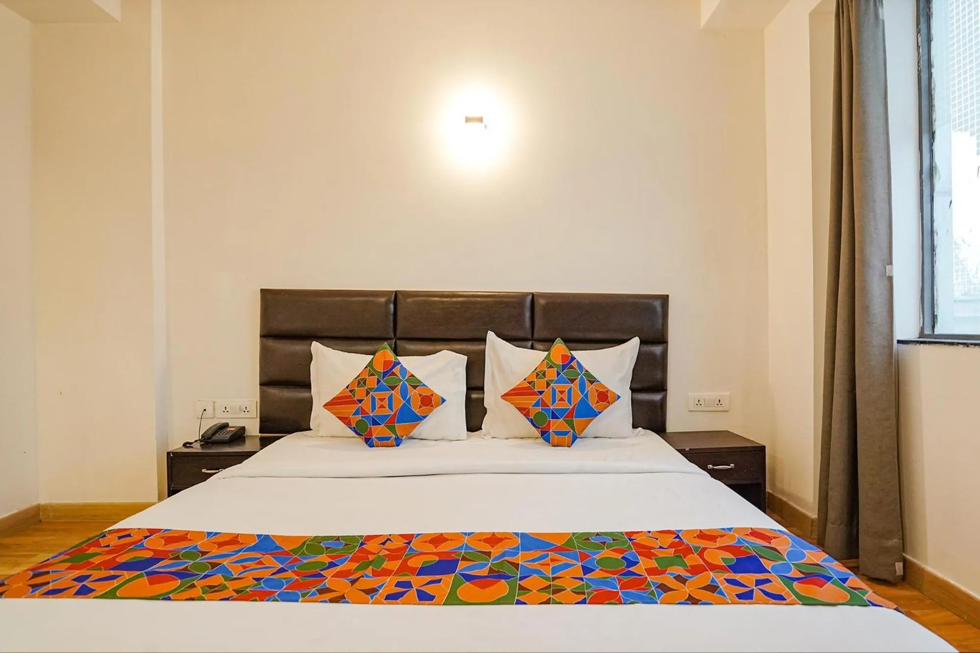 Bed in FabHotel Kaushambi