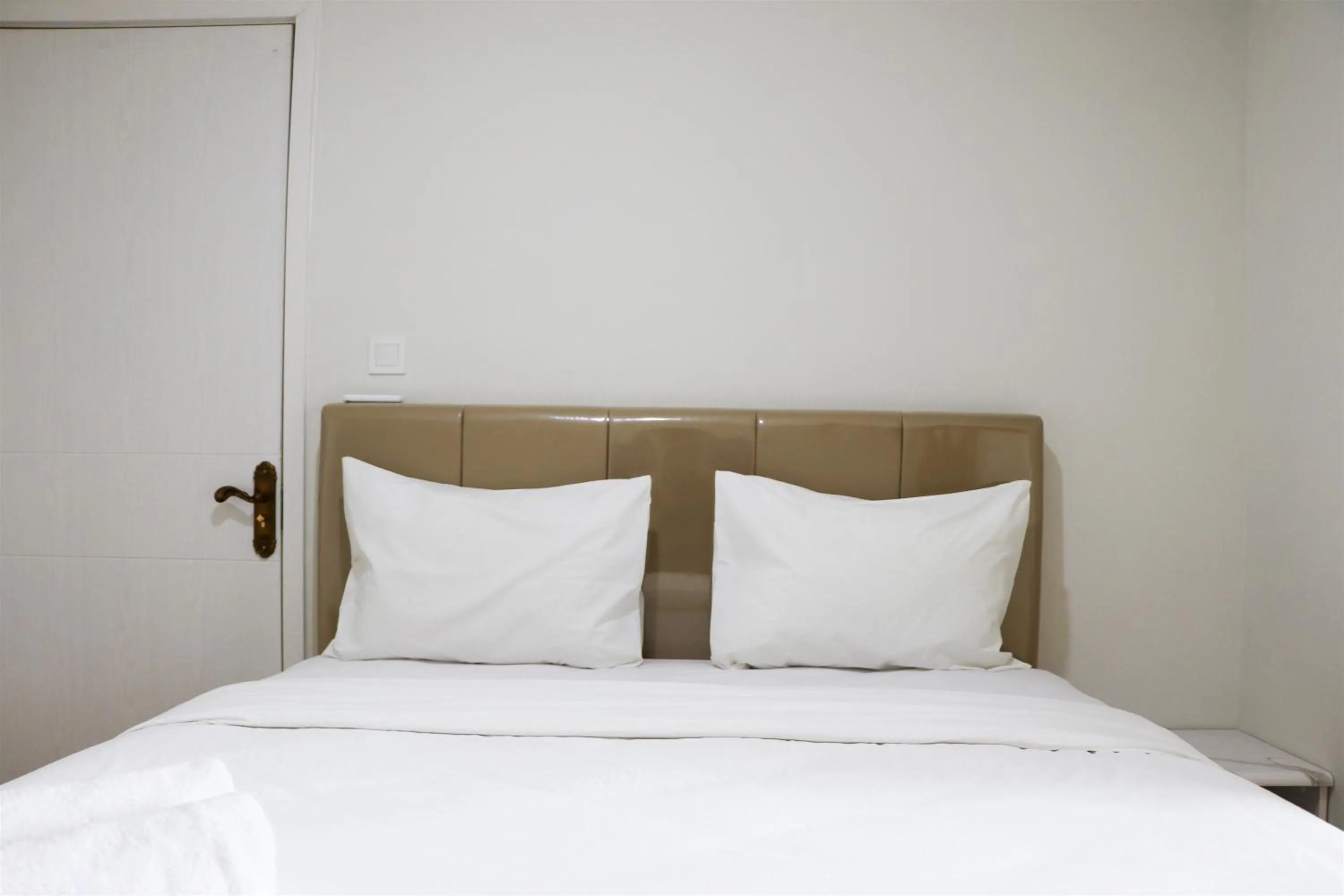 Homey and Comfort Living 2BR at Daan Mogot City Apartment By Travelio