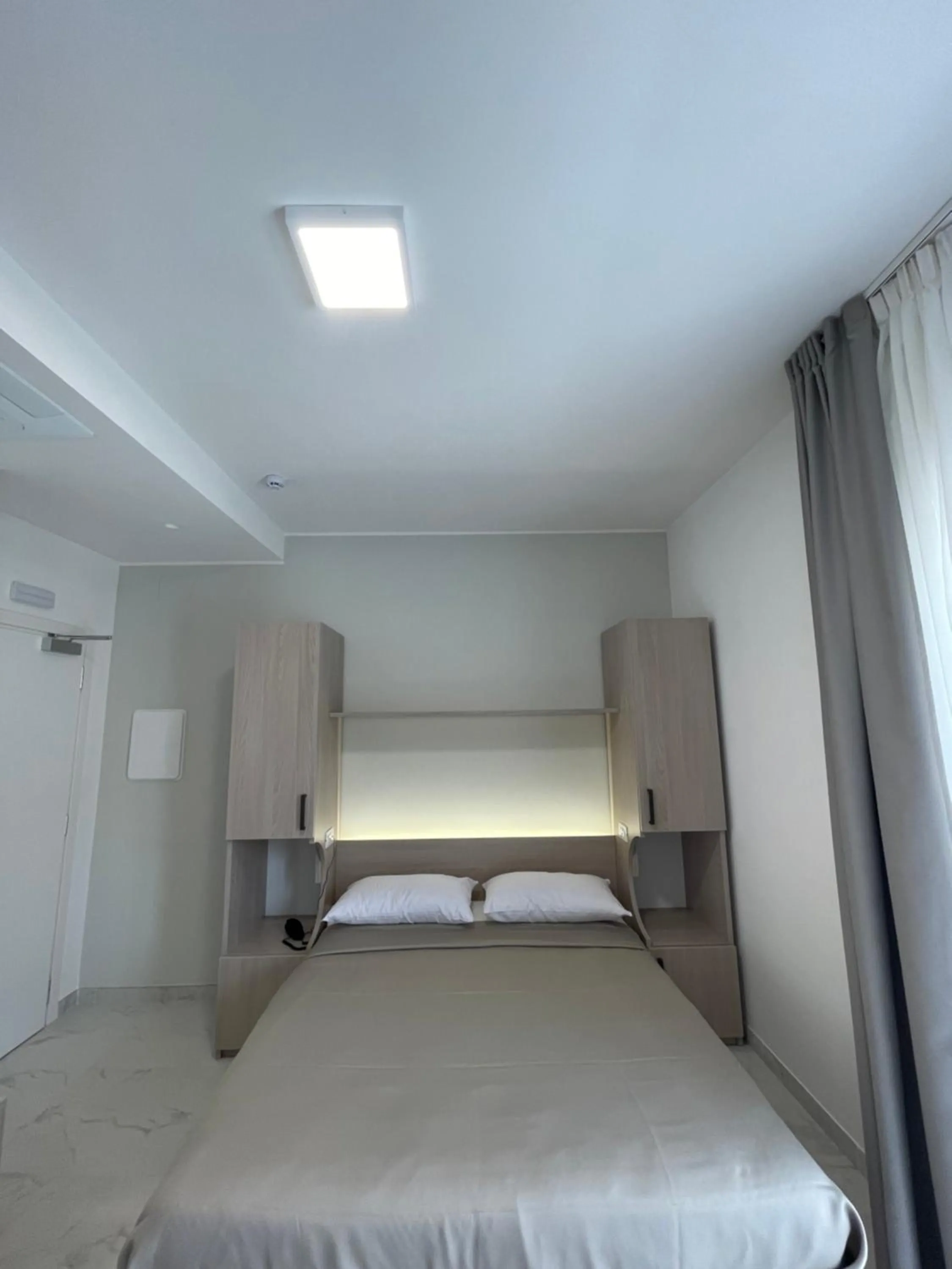 Bed in Hotel Diadema