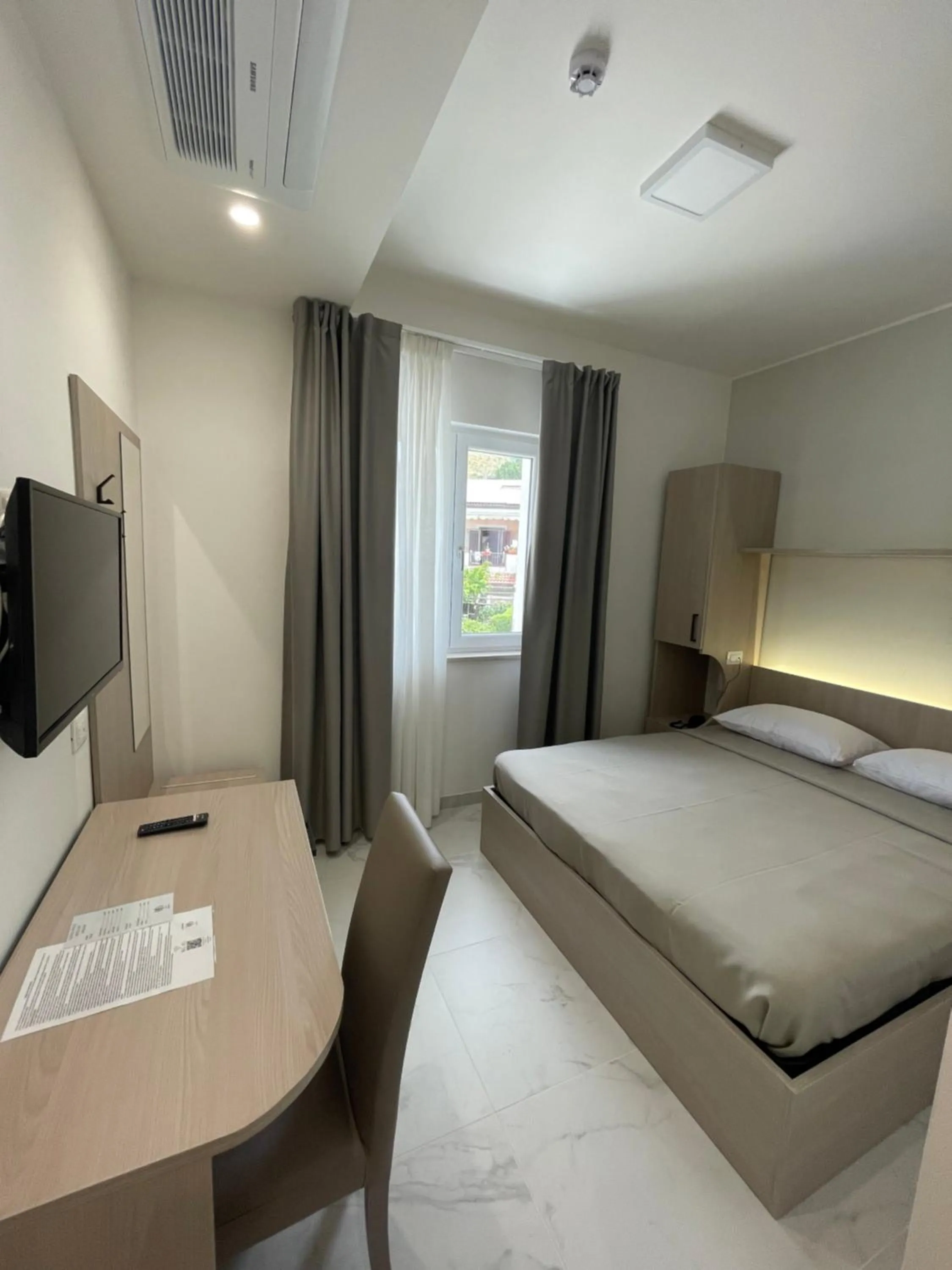 Bed in Hotel Diadema