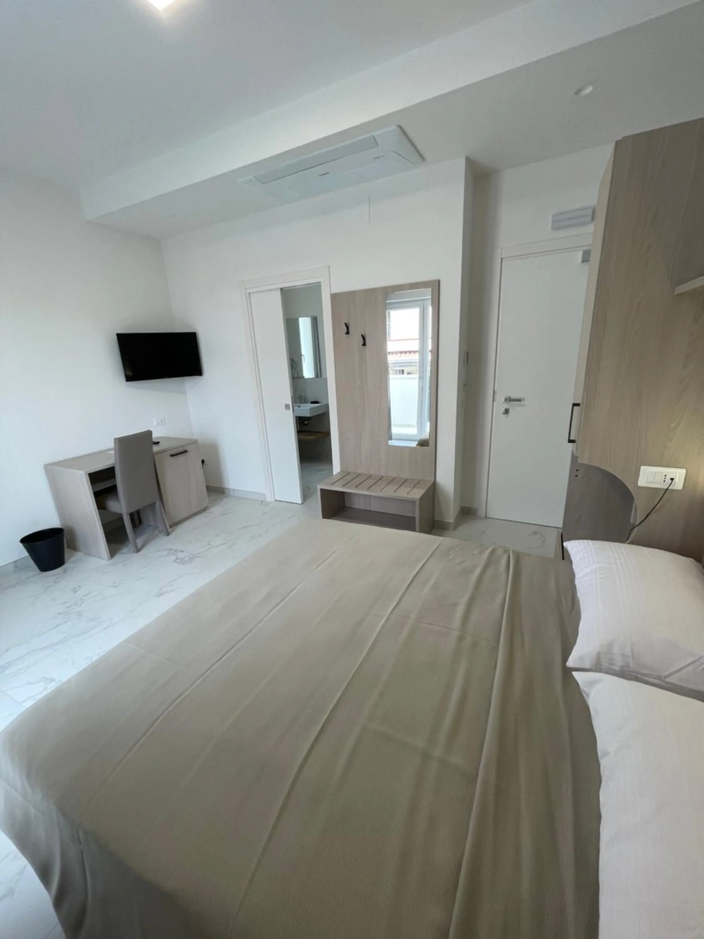 Bed in Hotel Diadema