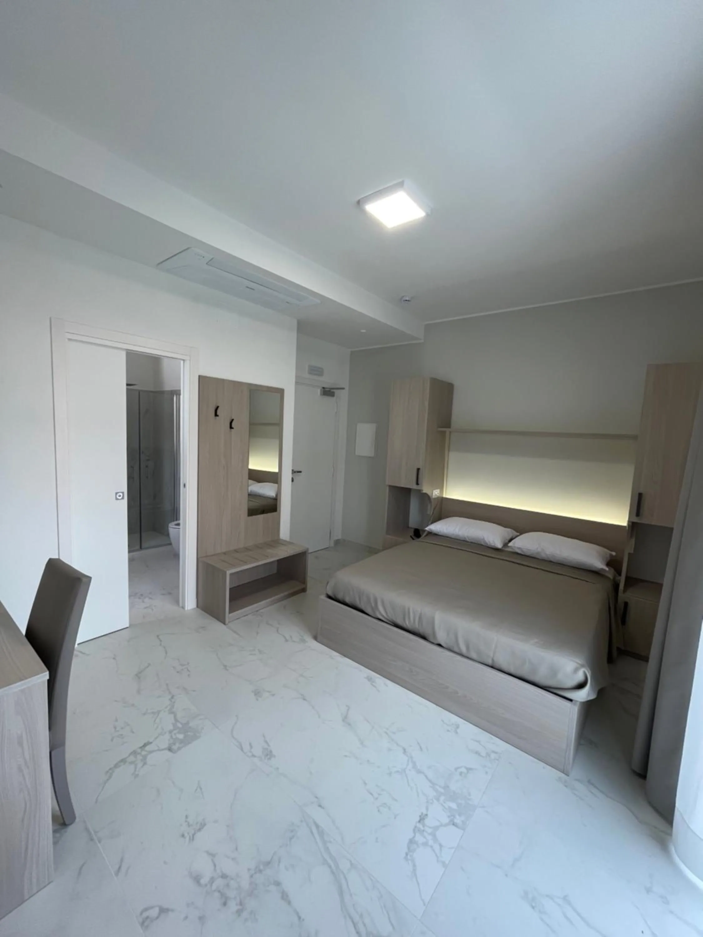 Bed in Hotel Diadema