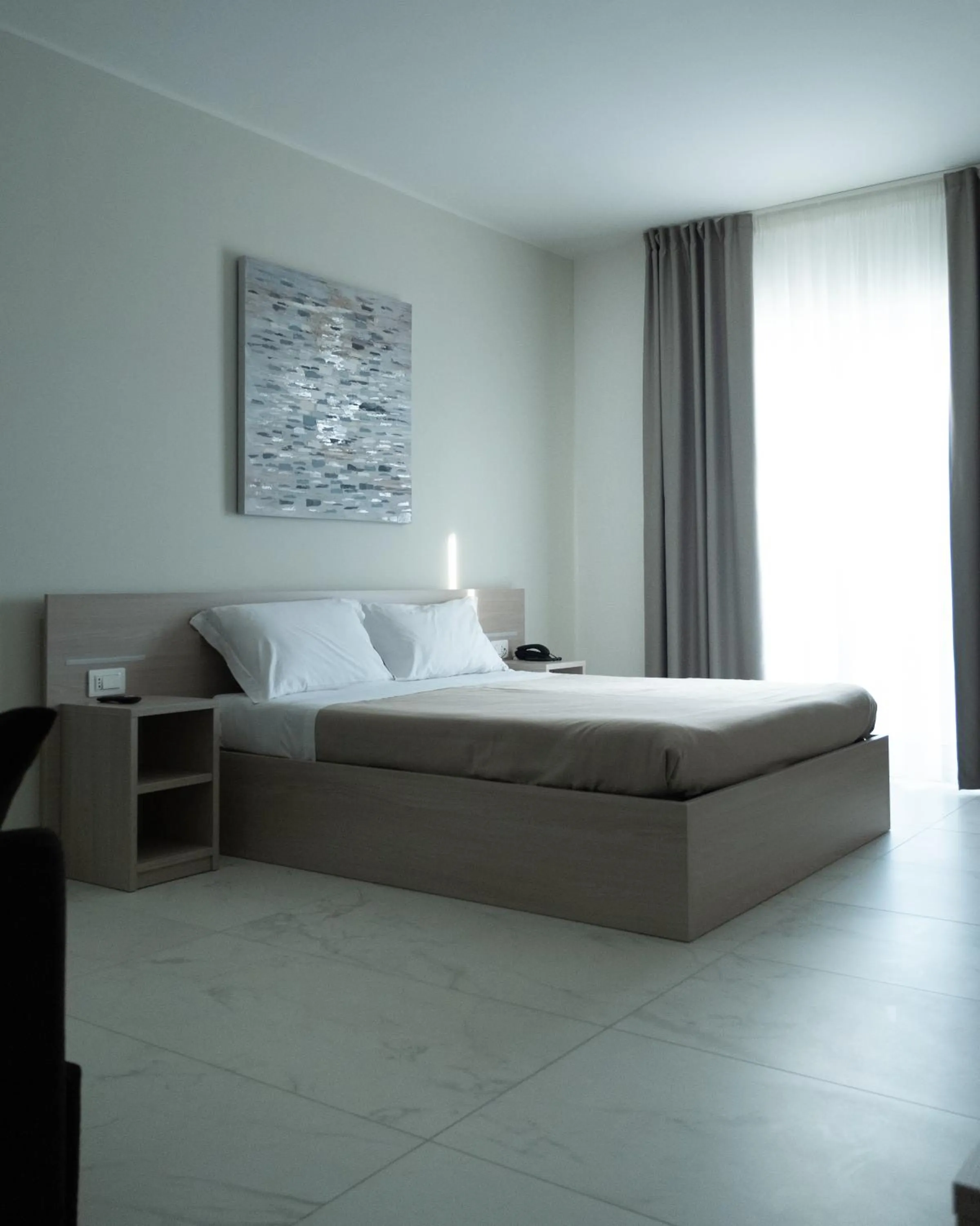 Bed in Hotel Diadema