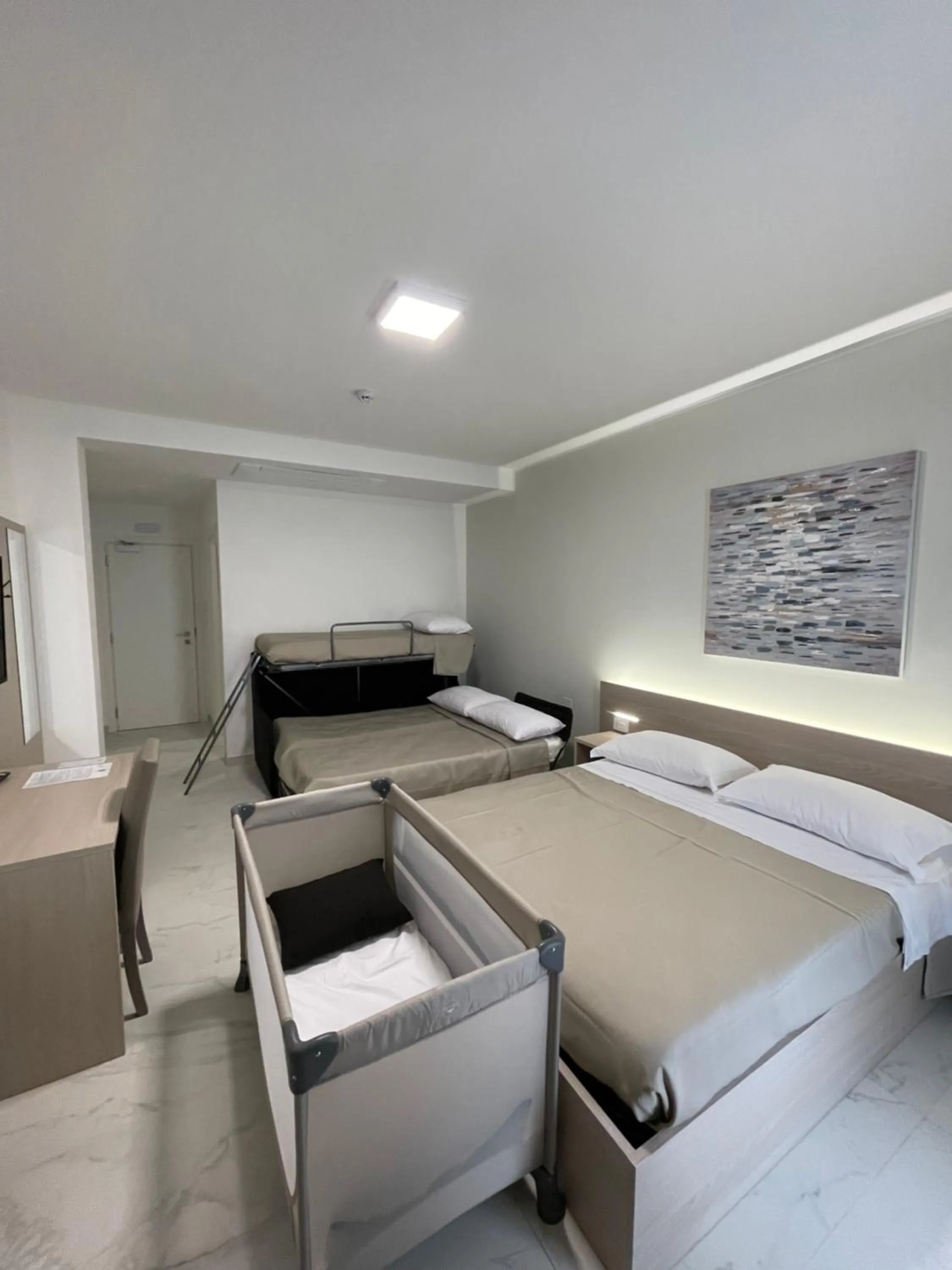 Bed in Hotel Diadema