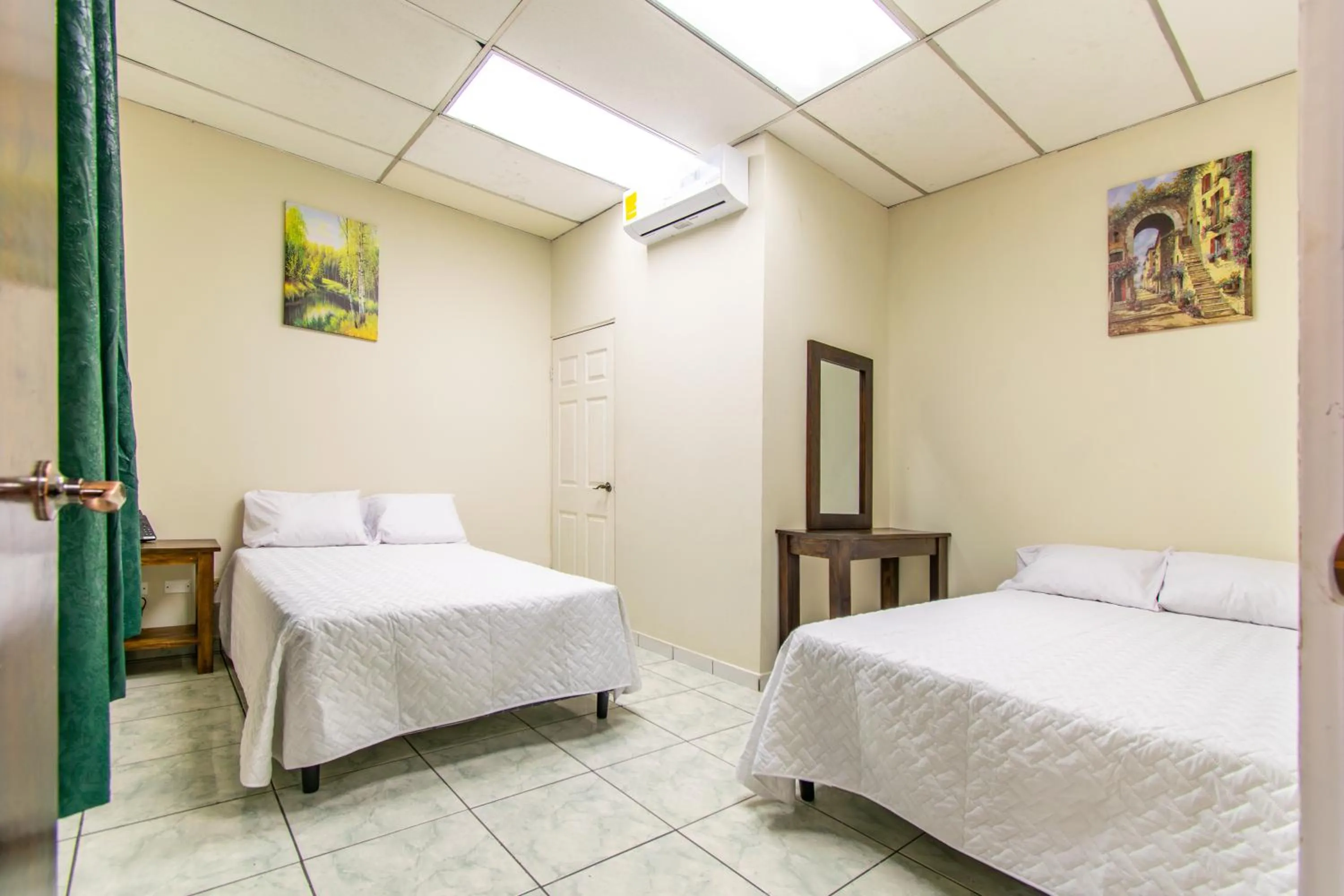 Bed in Lorenzo Hotel