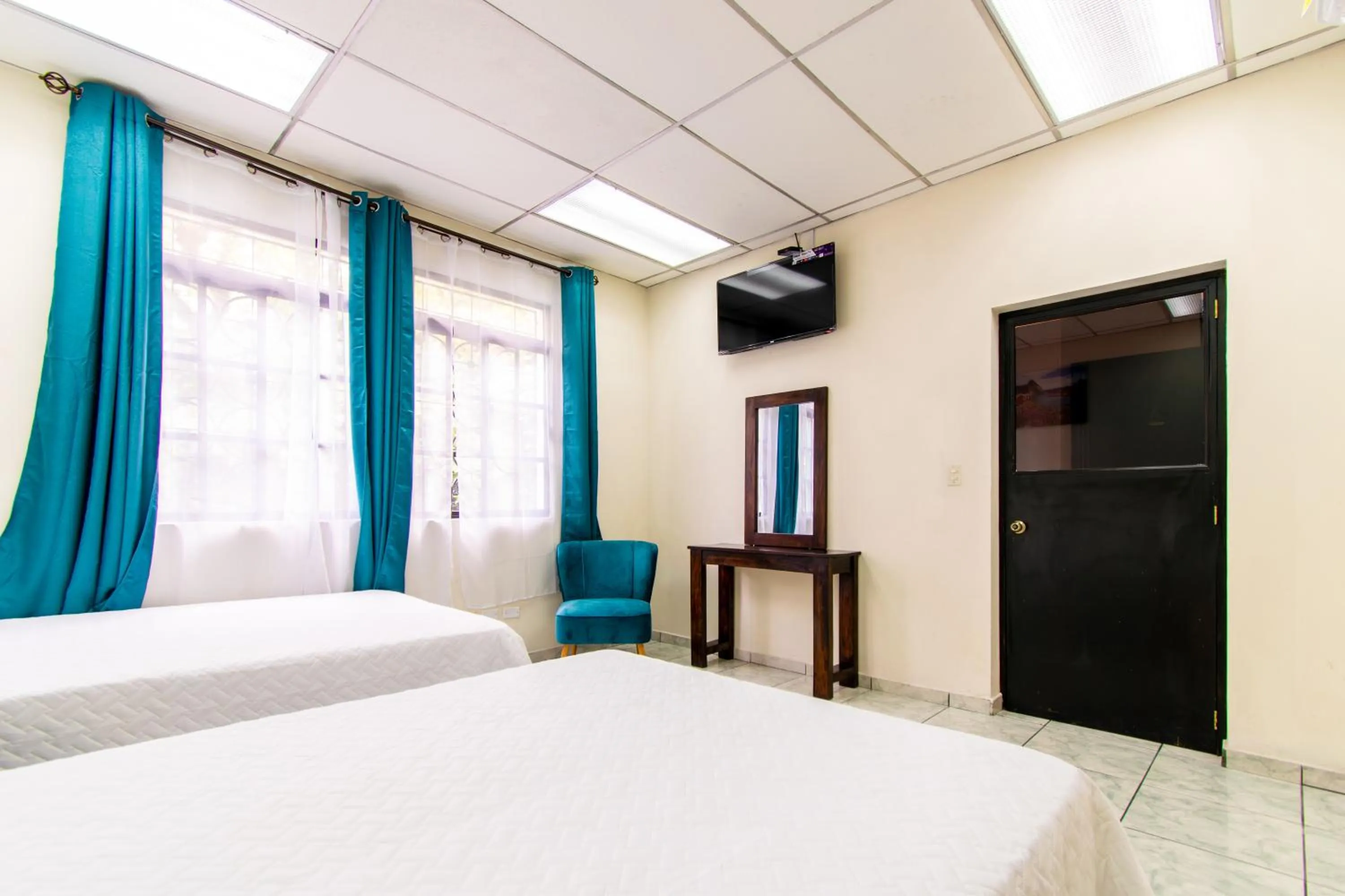 Bed in Lorenzo Hotel