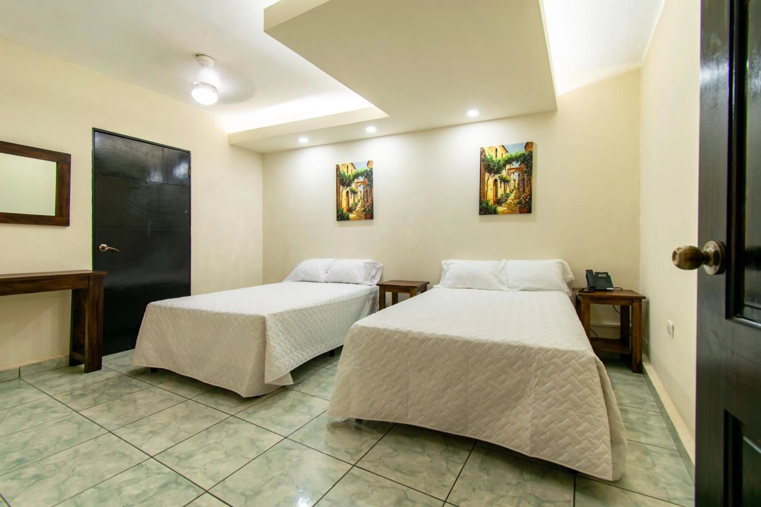 Bed in Lorenzo Hotel