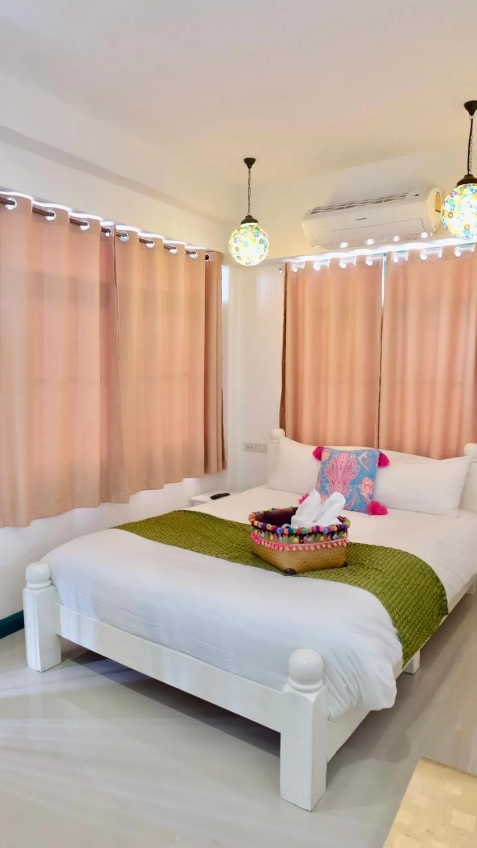 Bed in Yellow Lamoon Hotel