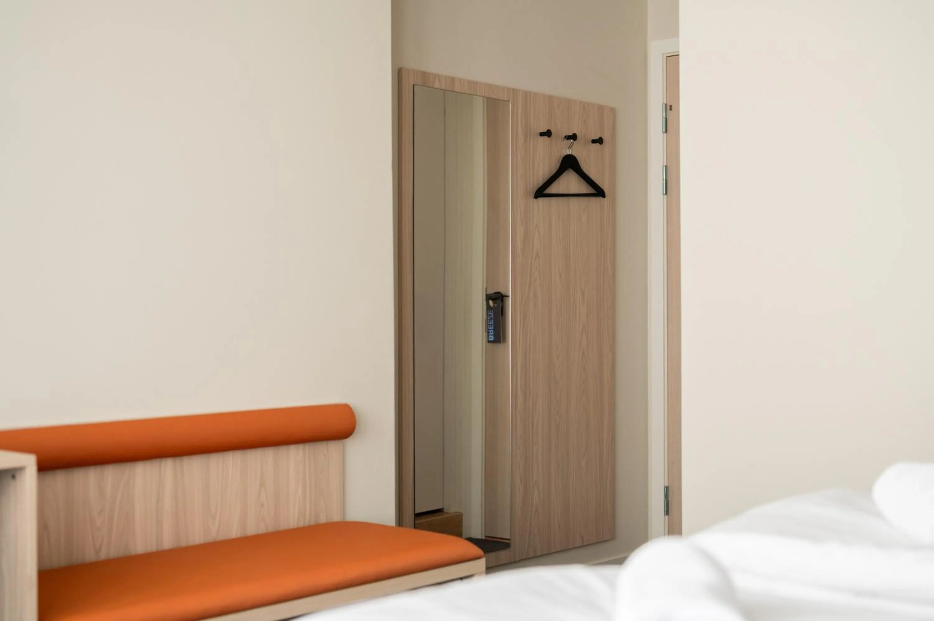 wardrobe, Bed in BREEZE Hotel Victoria - Self-Service