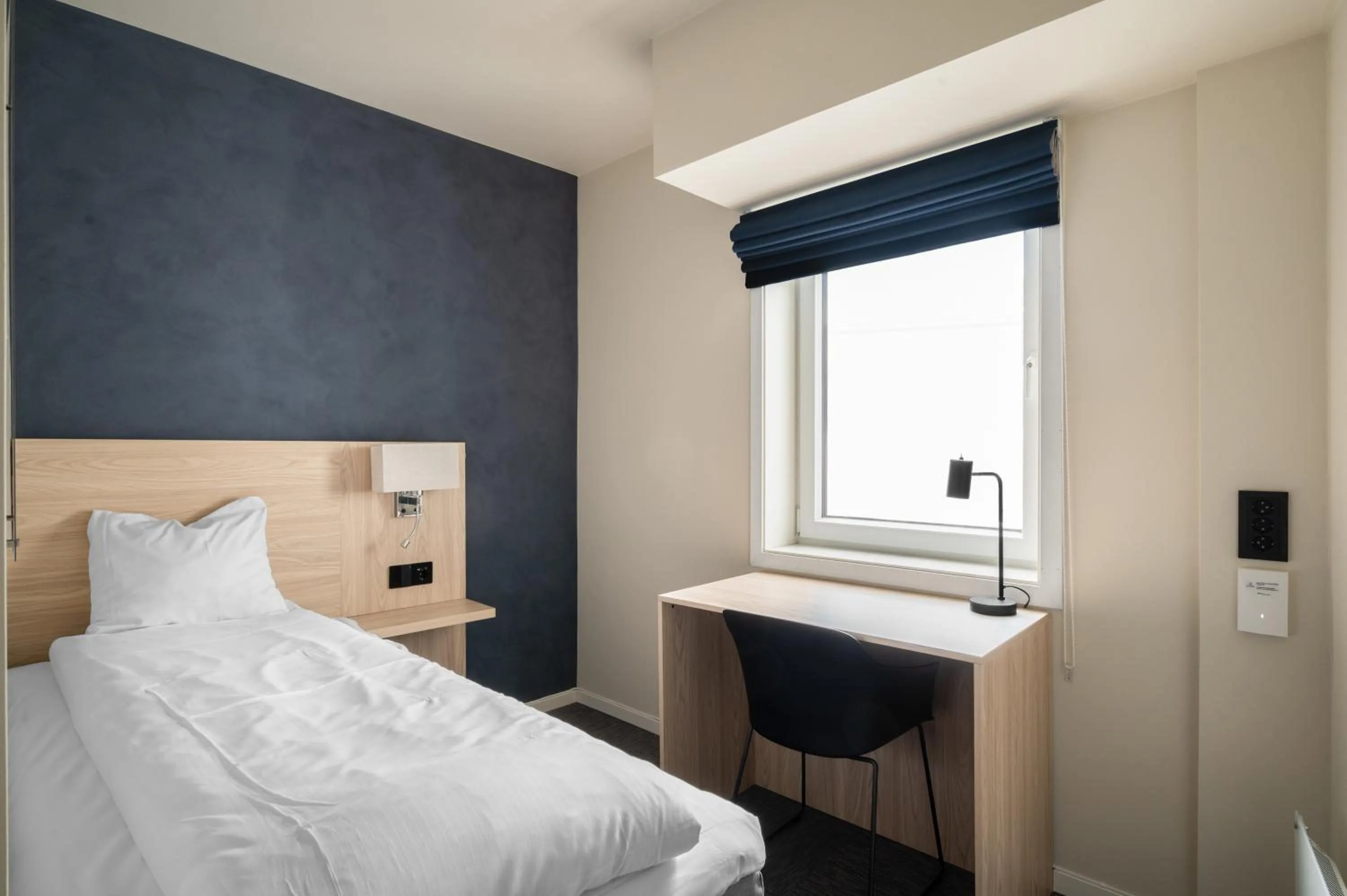 Photo of the whole room, Bed in BREEZE Hotel Victoria - Self-Service