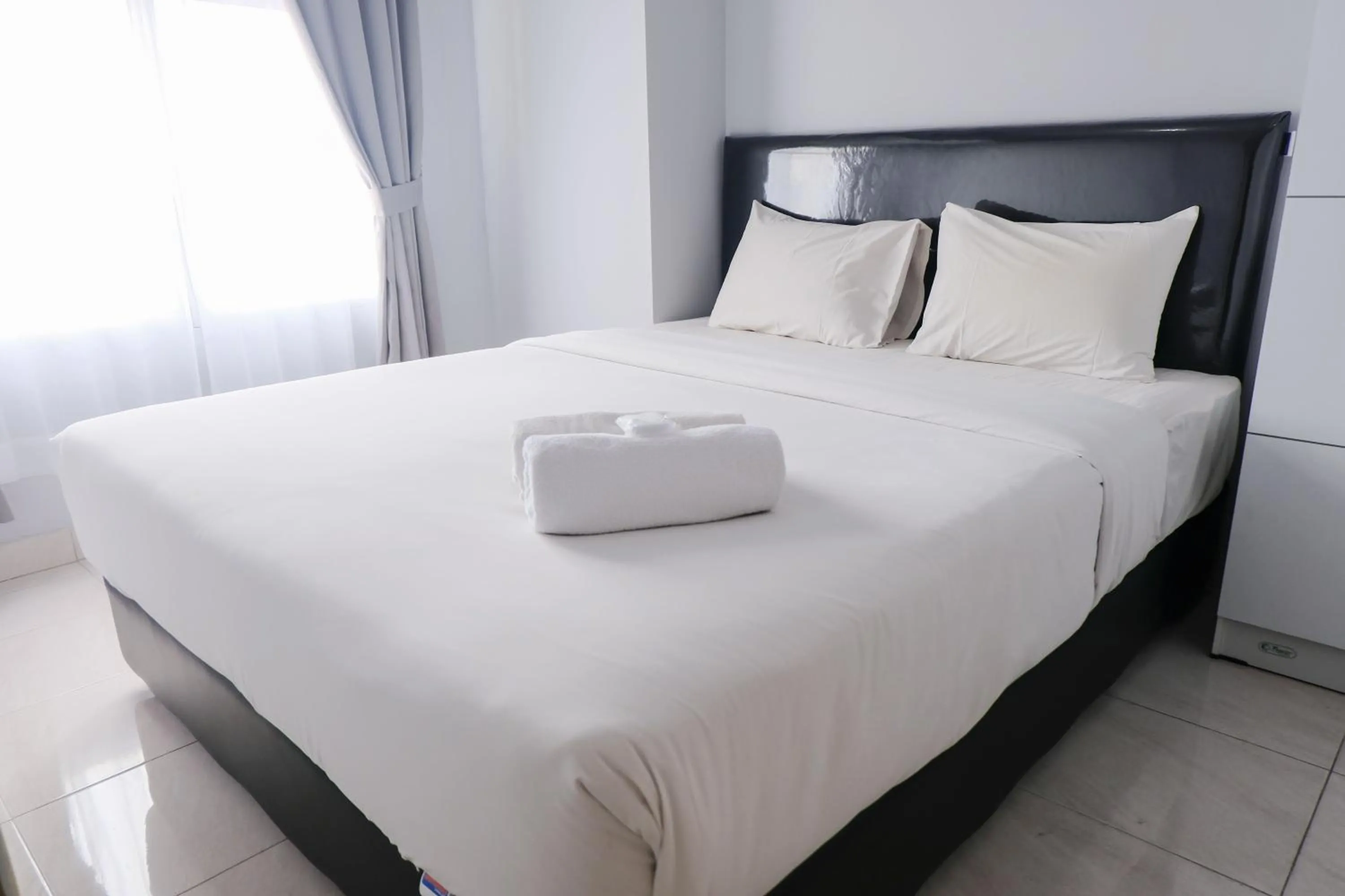 Homey 1BR Apartment at Newton Residence Bandung By Travelio