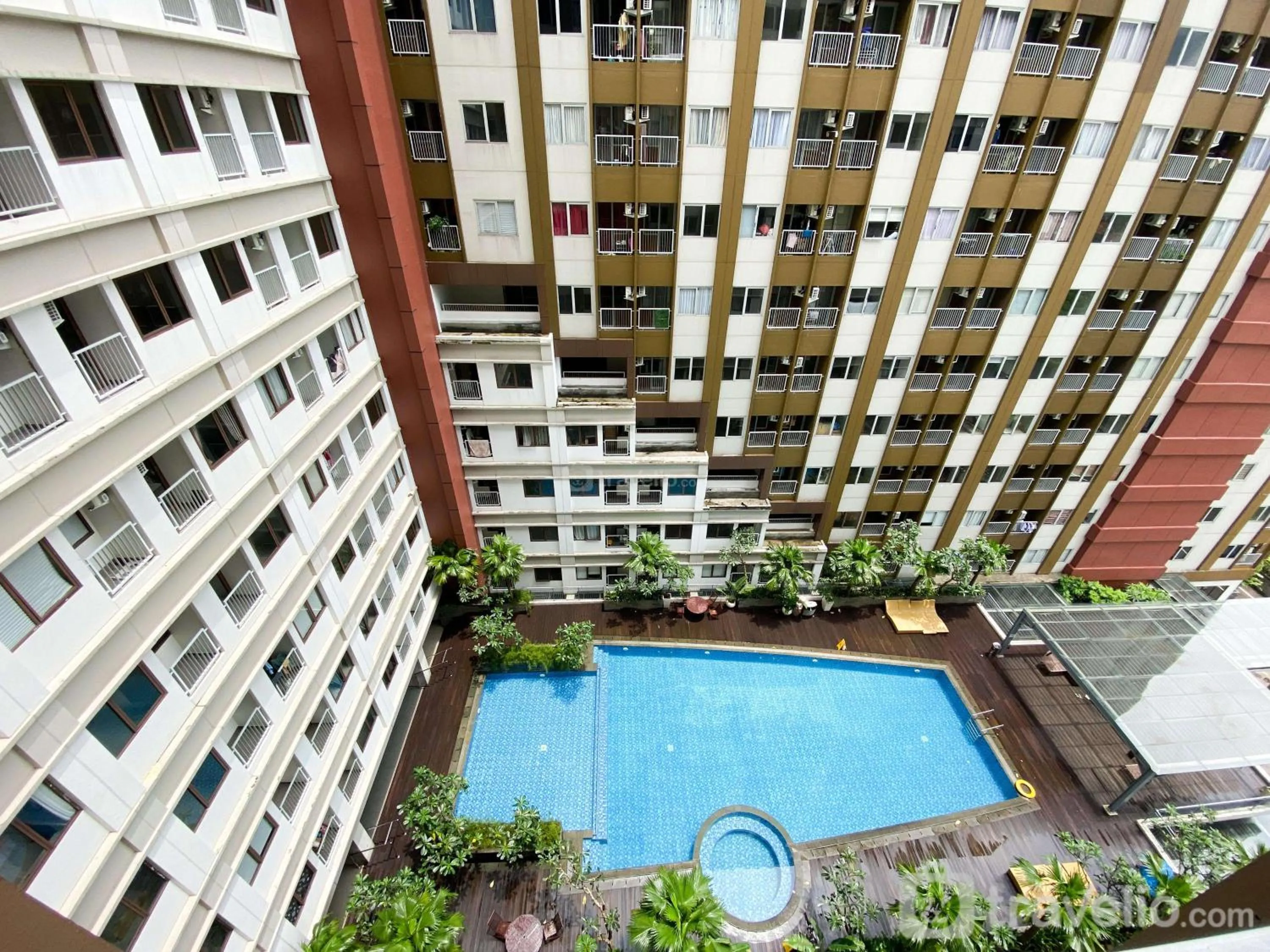 Property building in Homey and Cozy Stay Studio Gateway Park LRT City Jatibening Apartment By Travelio