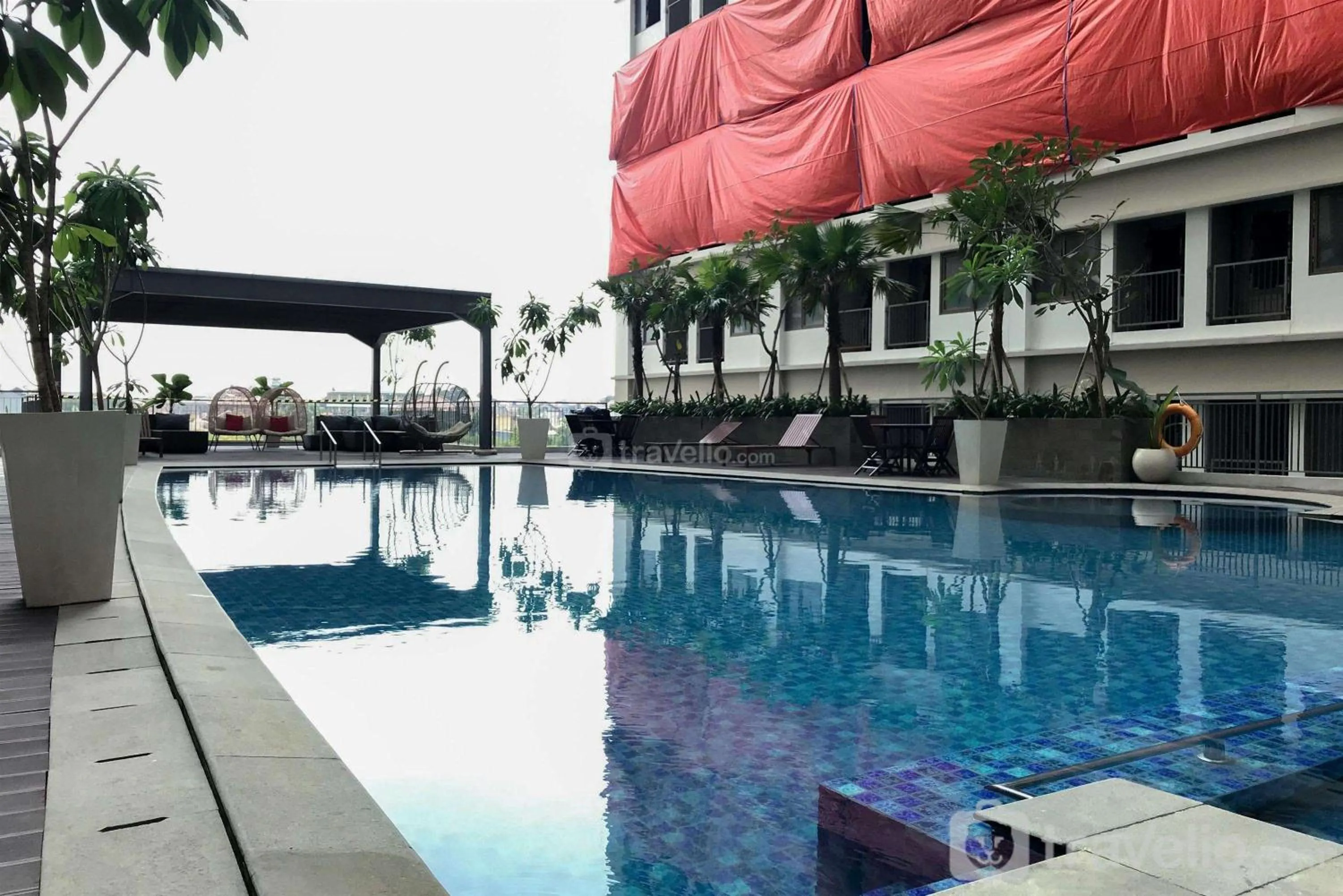 Swimming pool in Homey and Cozy Stay Studio Gateway Park LRT City Jatibening Apartment By Travelio