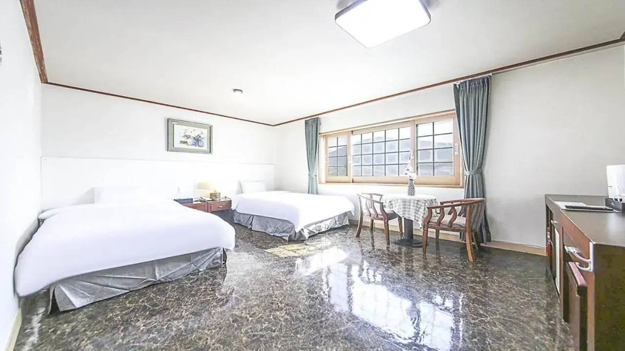 Bed in JeJu Golf Hotel Bed in JeJu Golf Hotel