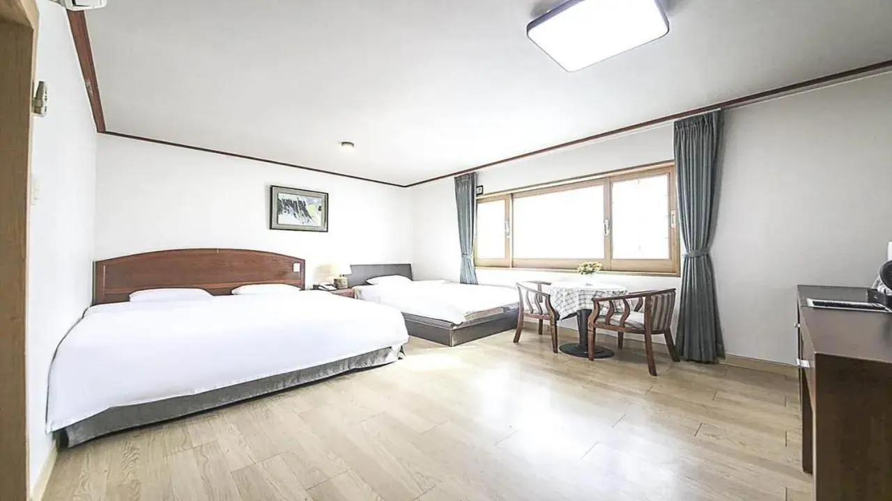 Bed in JeJu Golf Hotel Bed in JeJu Golf Hotel