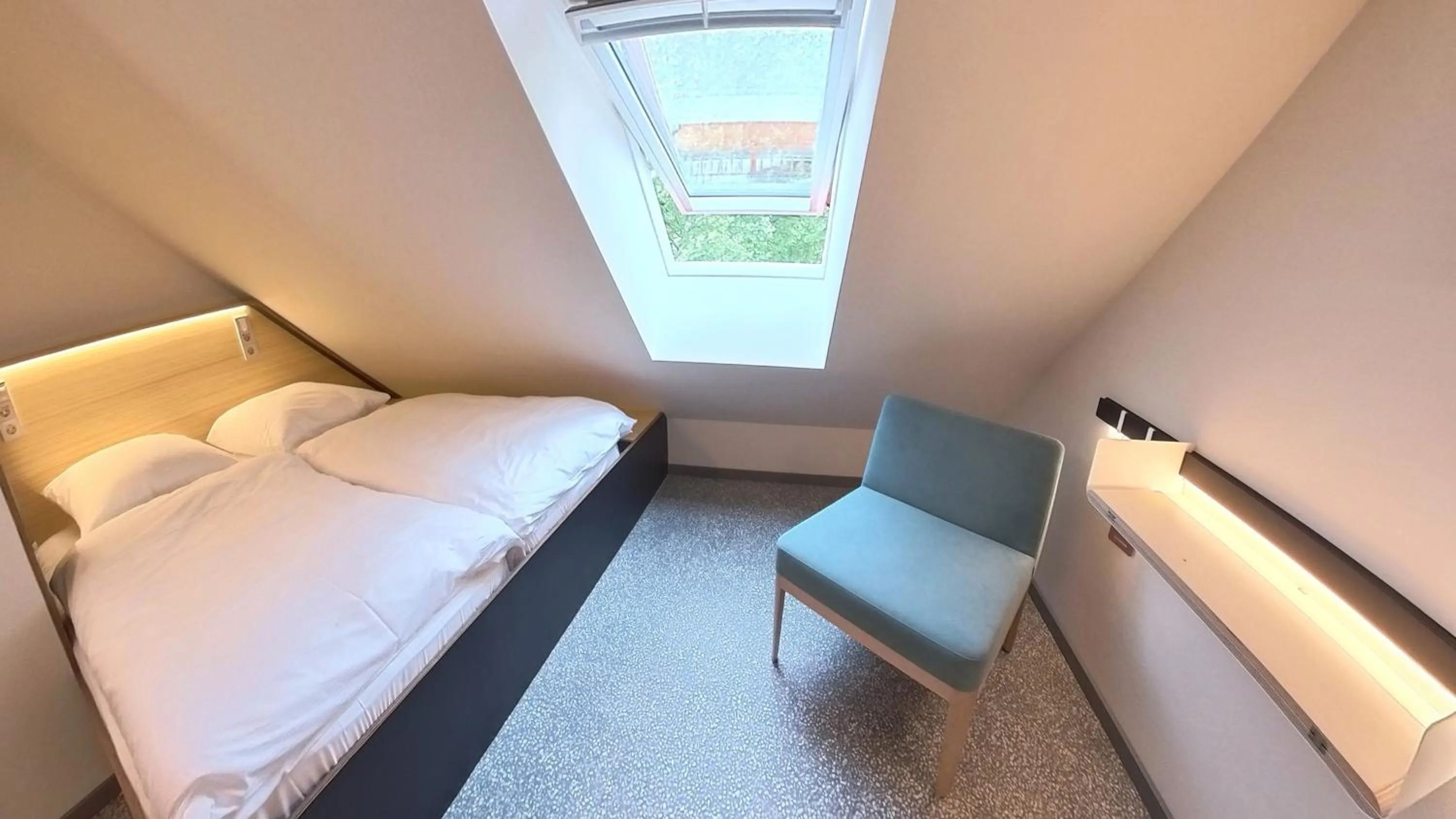 Seating area, Bed in Das Kittchen