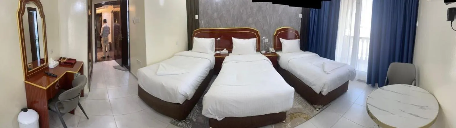 Bed in Galaxy Star Hotel