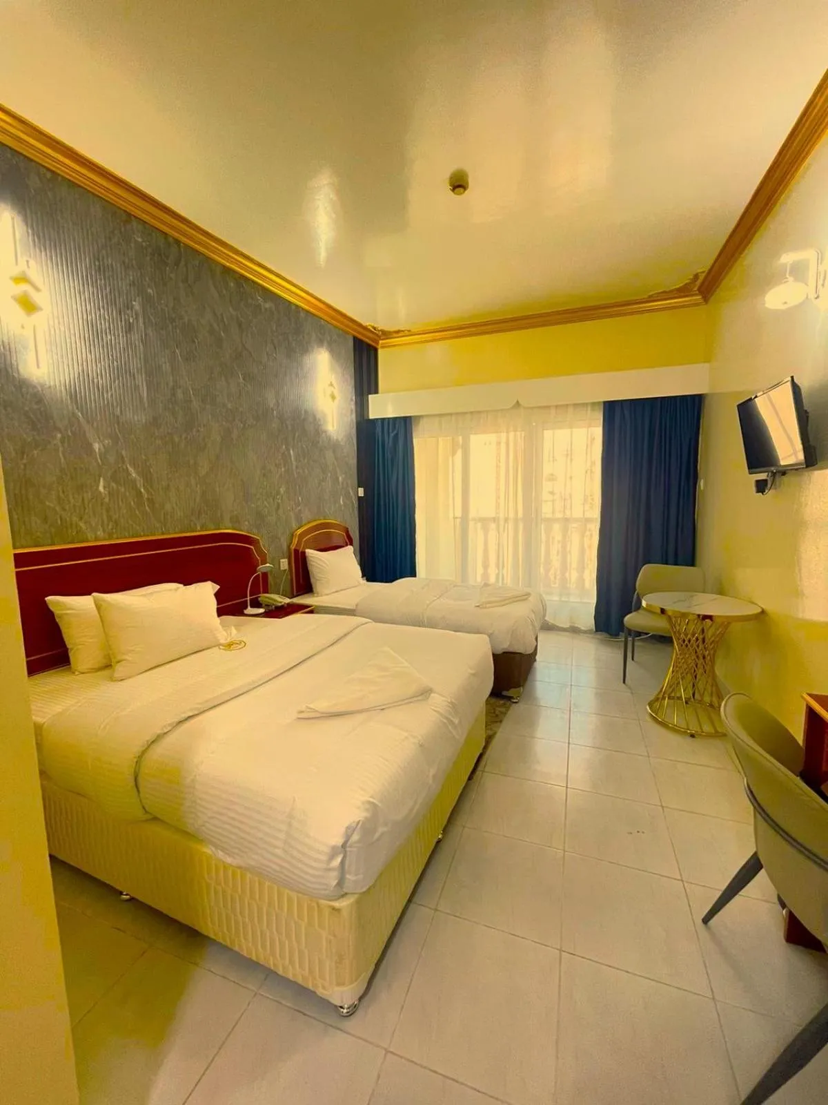 Bed in Galaxy Star Hotel