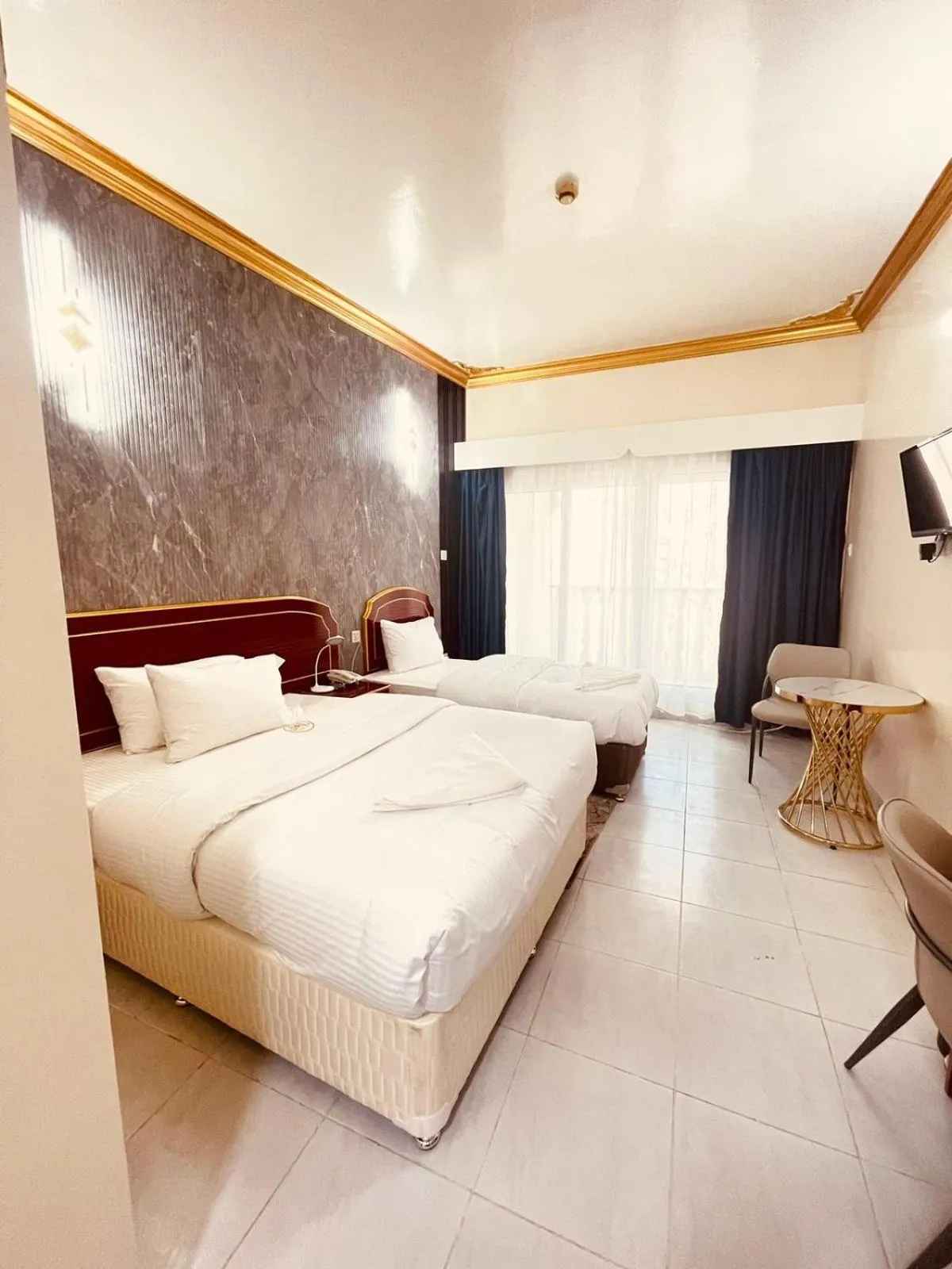 Bed in Galaxy Star Hotel