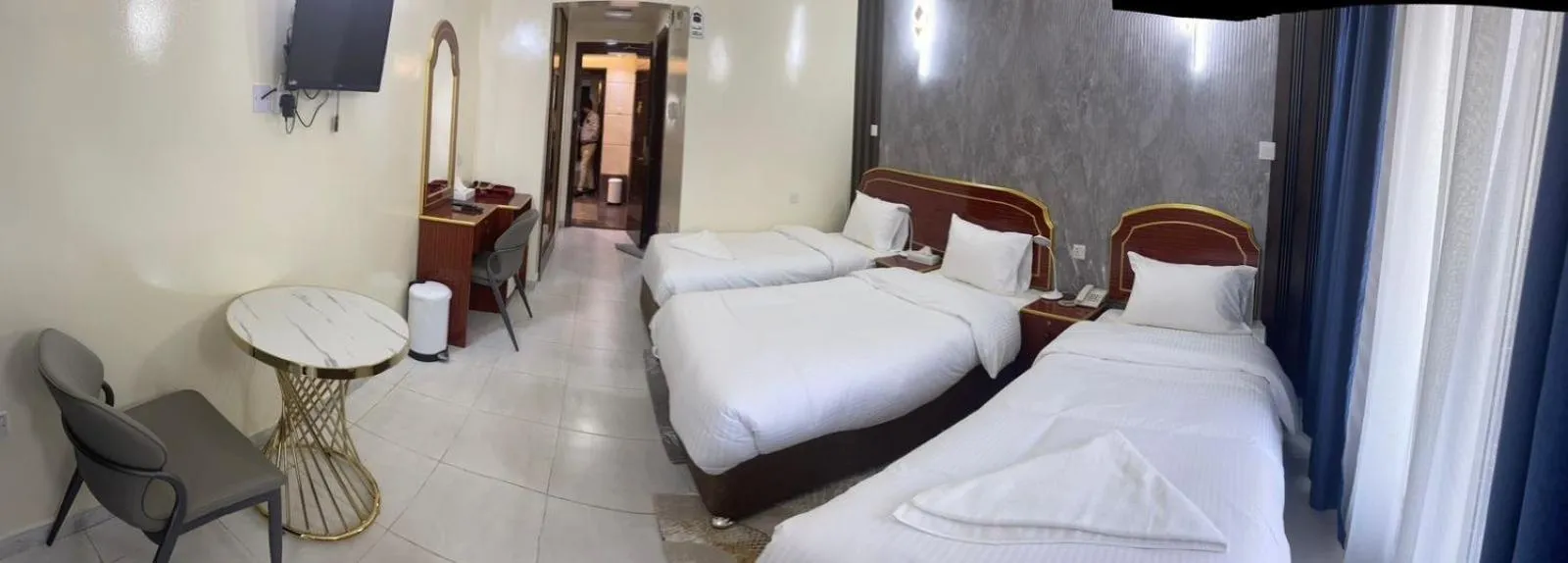 Bed in Galaxy Star Hotel