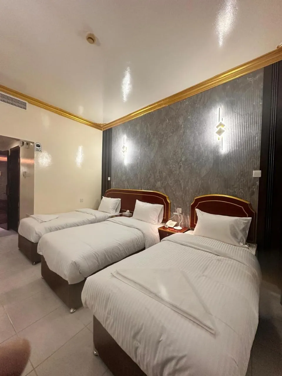 Bed in Galaxy Star Hotel