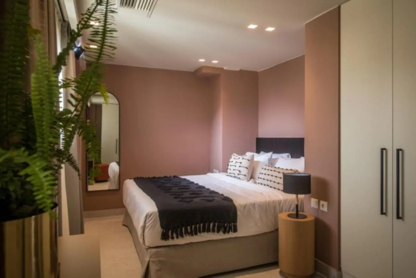 Bed in Centro Vero Suites by Omilos Hotels