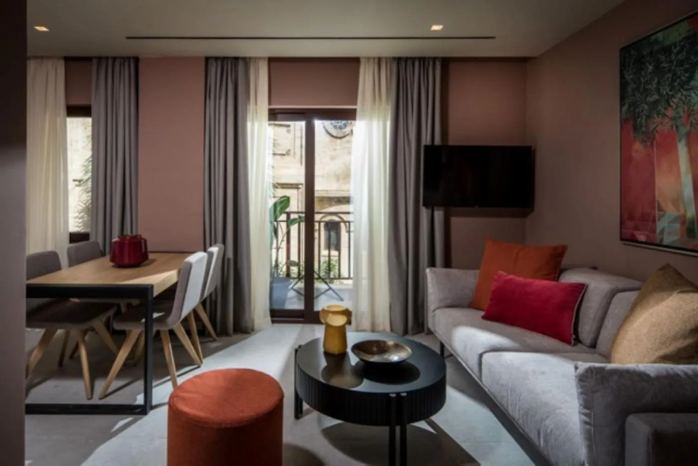 Communal lounge/ TV room in Centro Vero Suites by Omilos Hotels